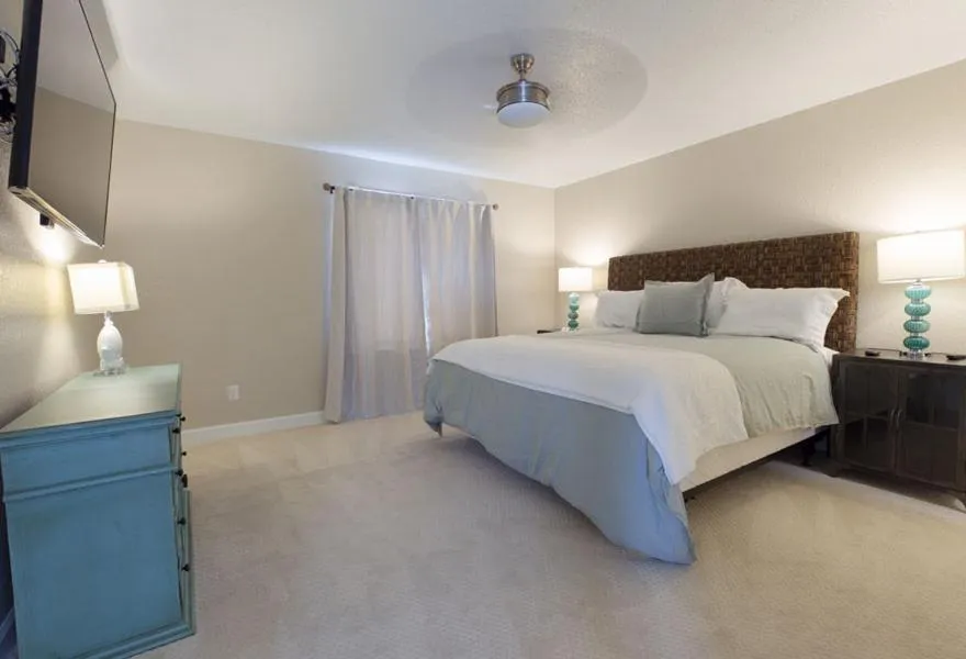 Bed in Sandpiper Beacon Beach Resort