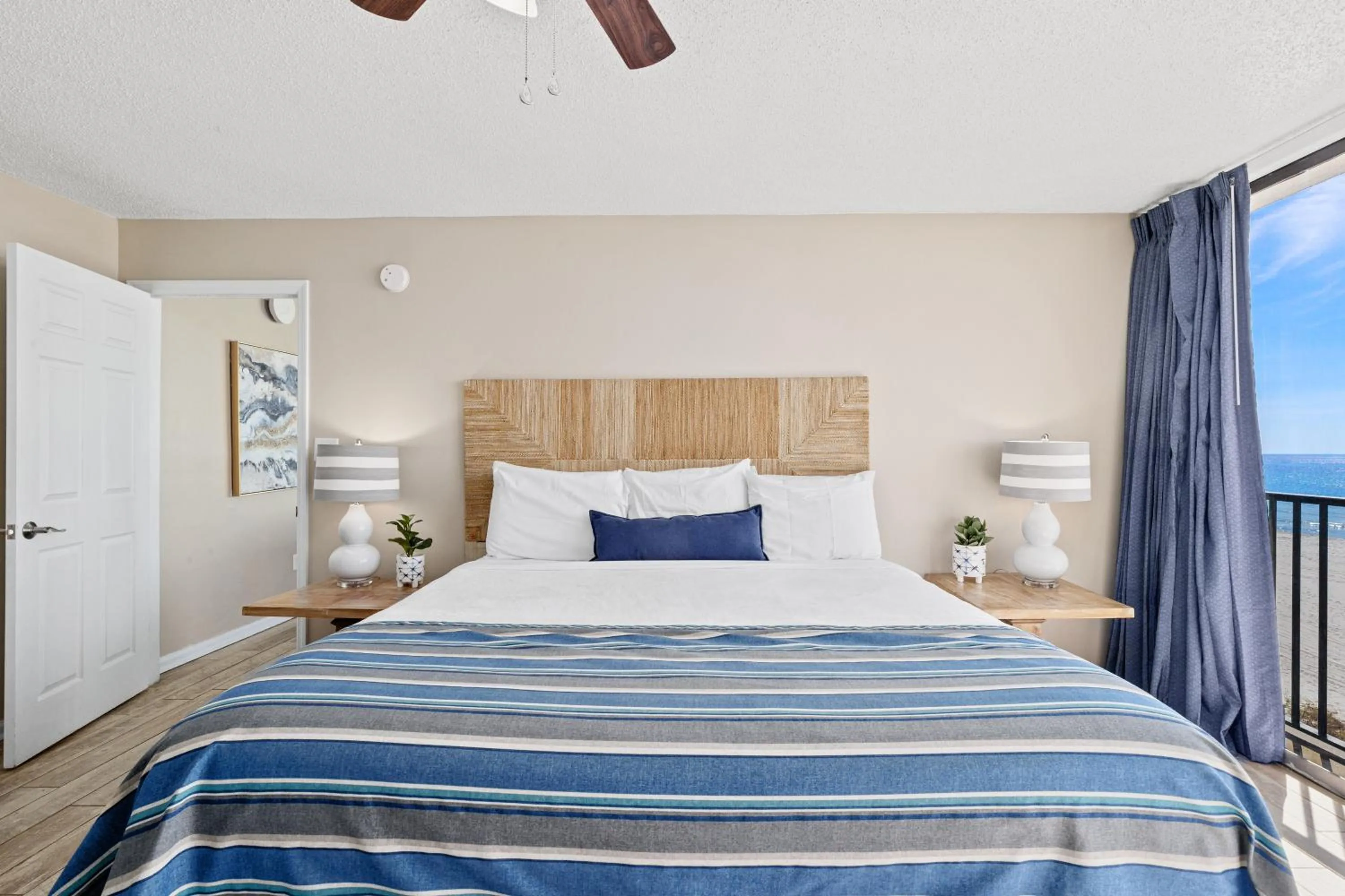 Bed in Sandpiper Beacon Beach Resort