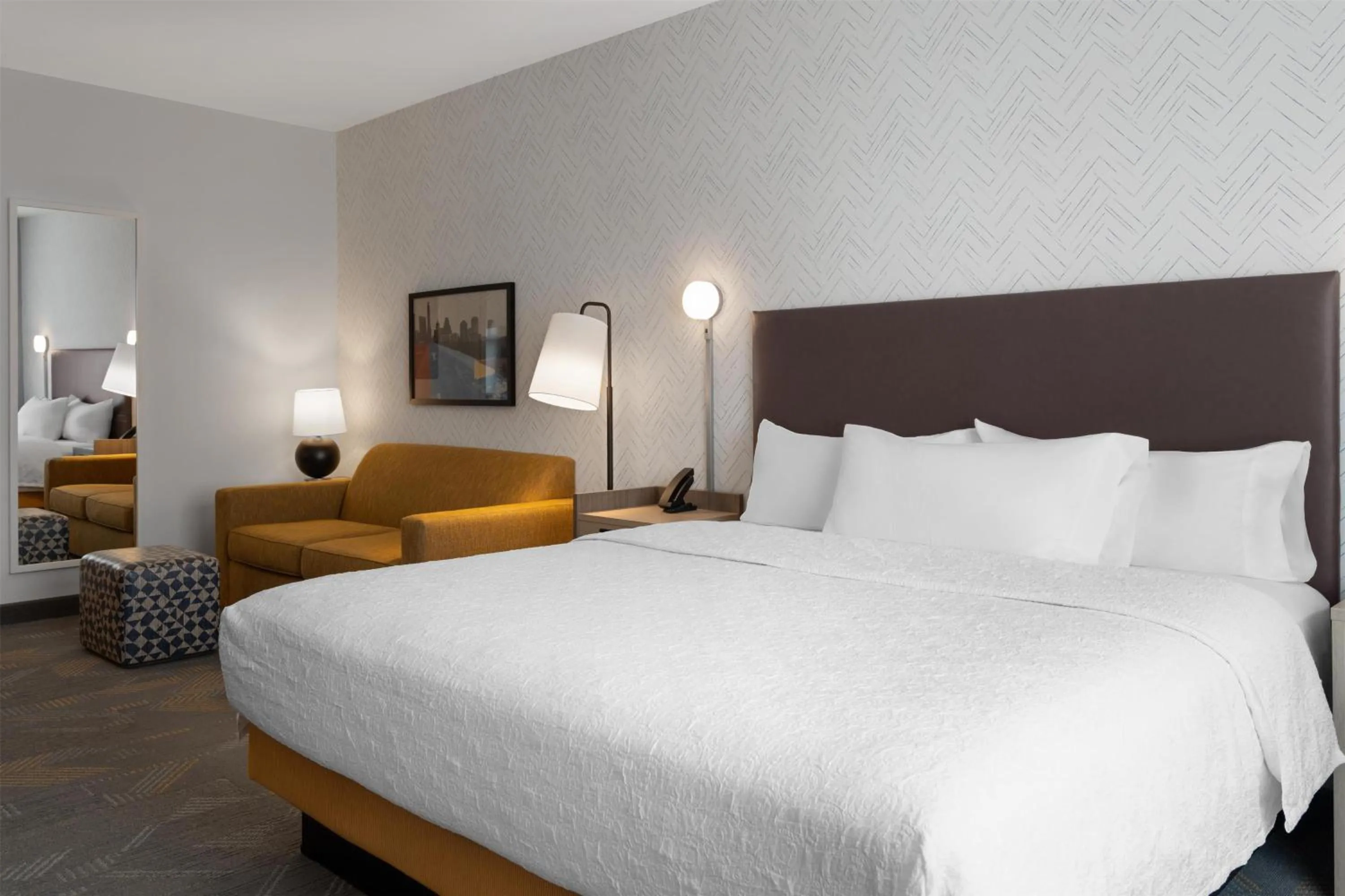 Living room, Bed in Home2 Suites By Hilton Austin South