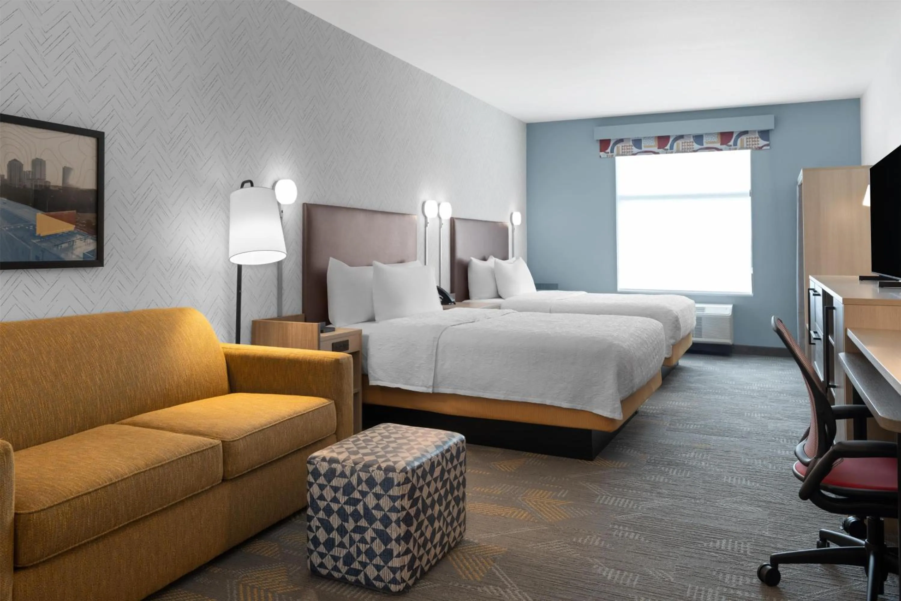 Living room, Bed in Home2 Suites By Hilton Austin South