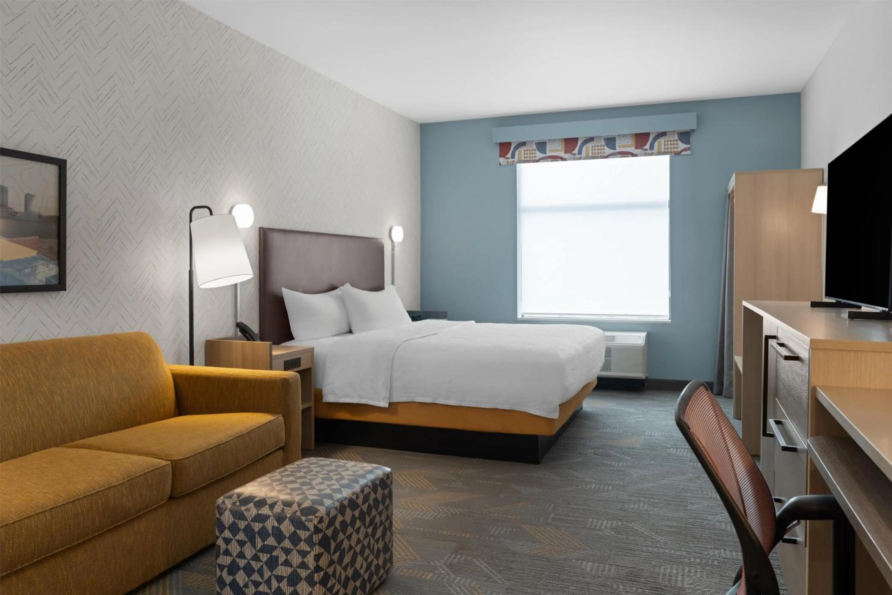 Living room, Bed in Home2 Suites By Hilton Austin South