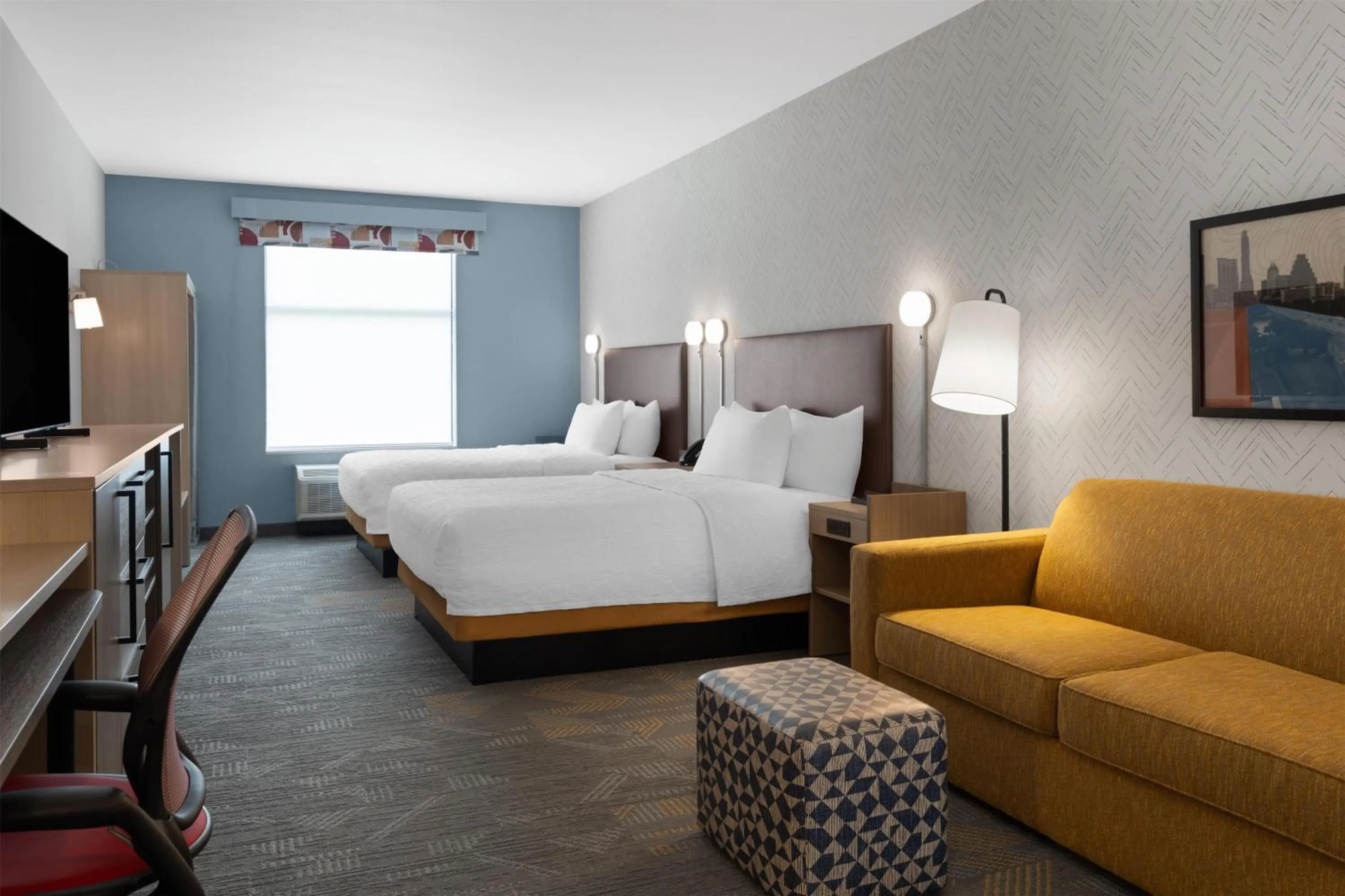 Living room, Bed in Home2 Suites By Hilton Austin South