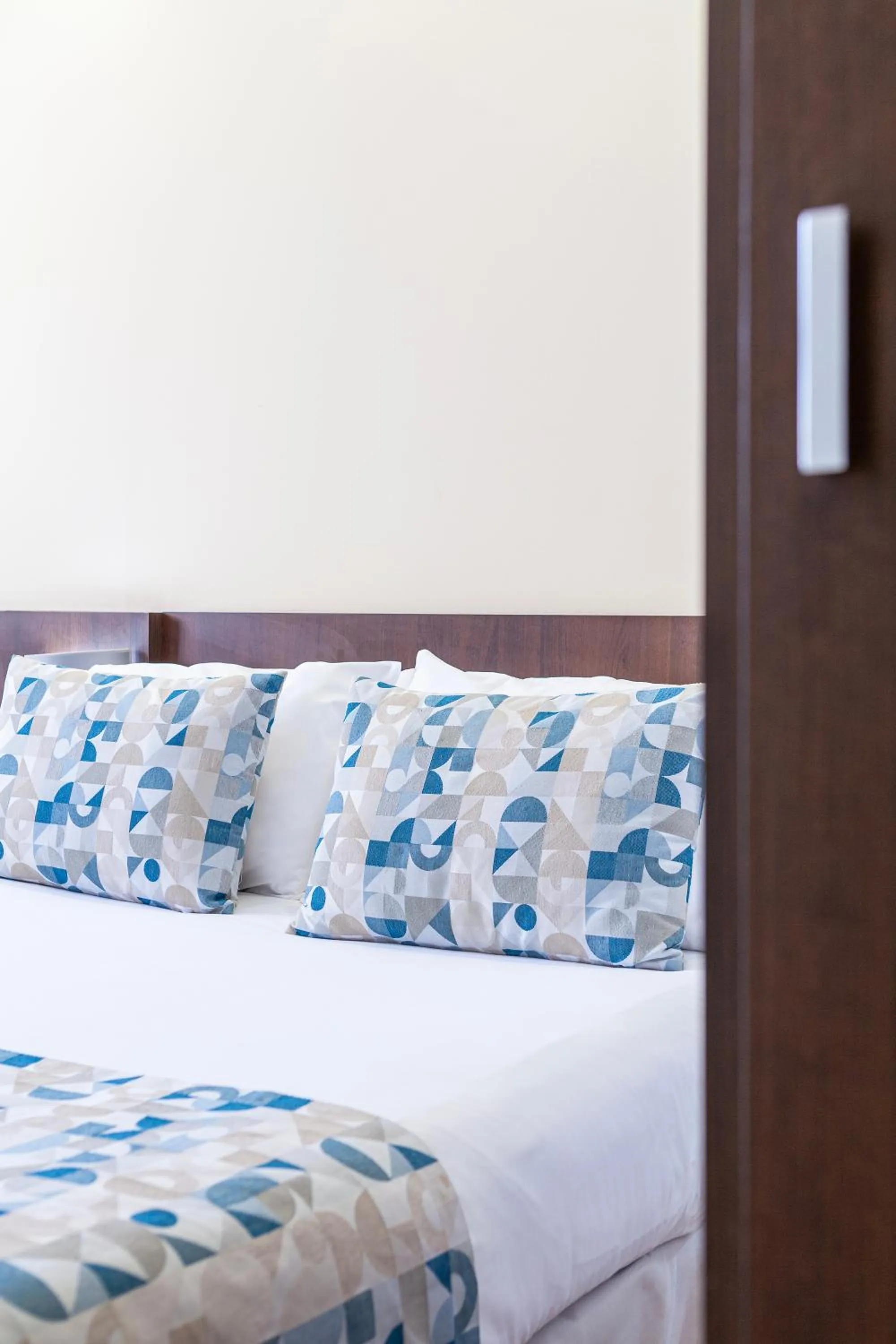 Decorative detail, Bed in Hotel Olympia Universidades