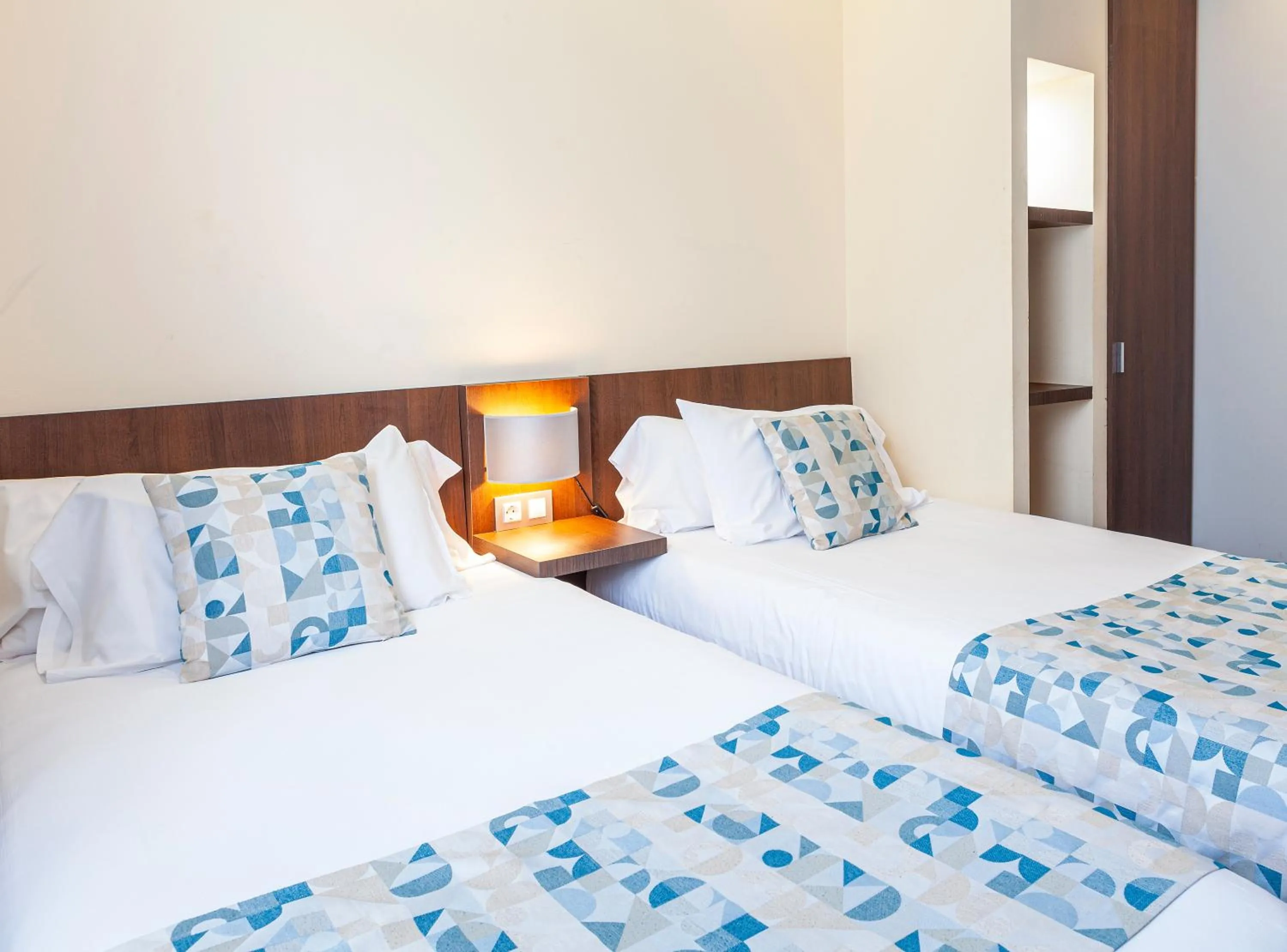 Decorative detail, Bed in Hotel Olympia Universidades