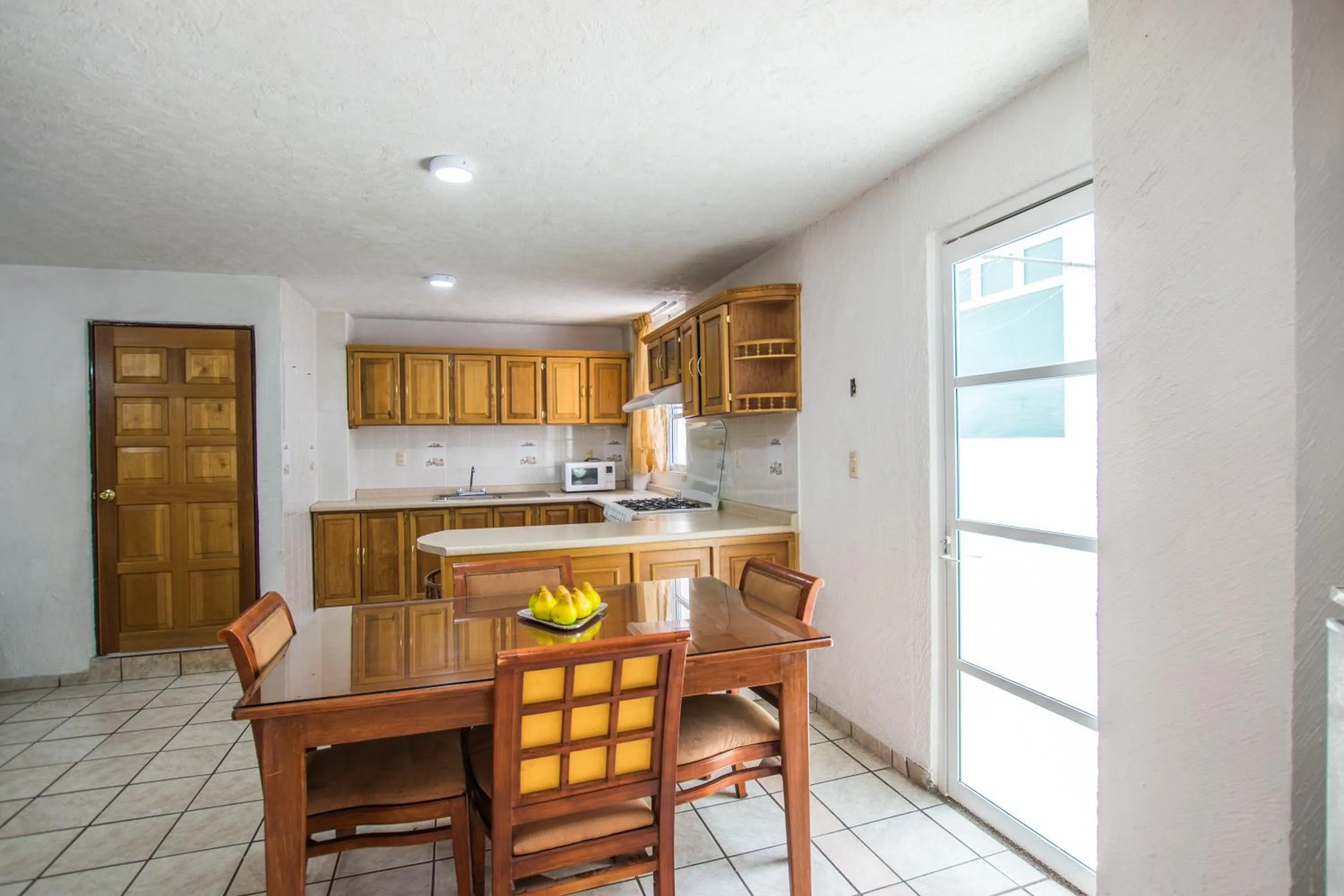 Kitchen or kitchenette in Suites Poliforum Inn