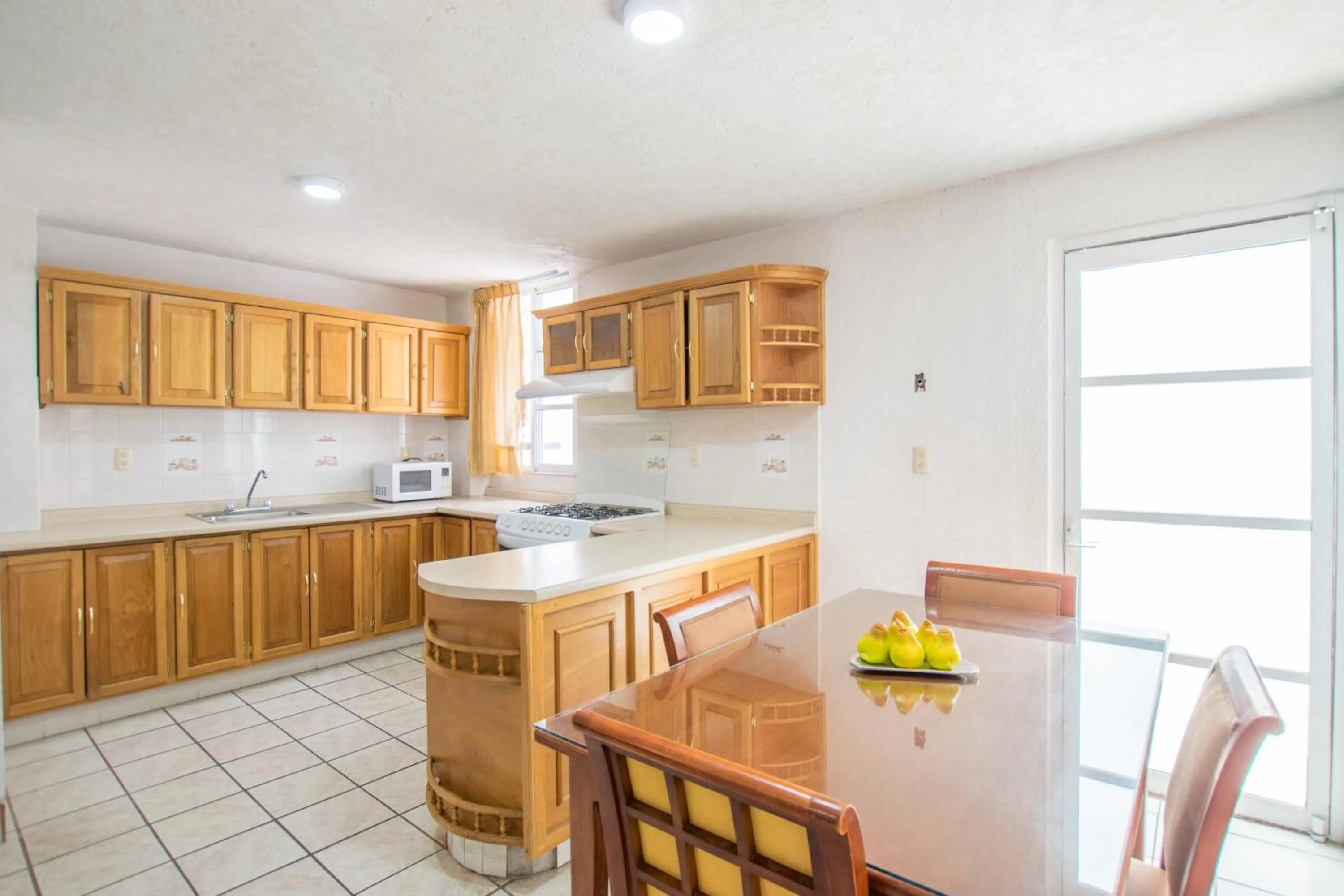 Kitchen or kitchenette in Suites Poliforum Inn