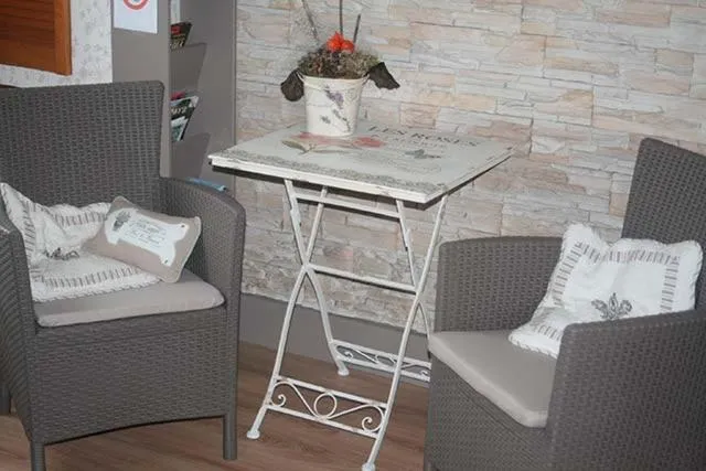 Seating area in B&B Ferme du Petit Breuil