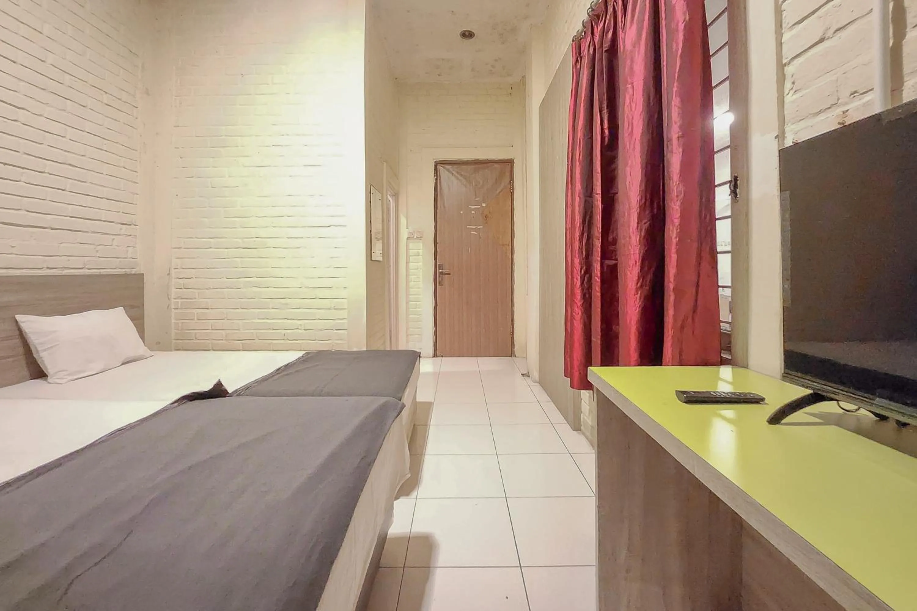 Bedroom, Bed in Urbanview Hotel Star Residence Puncak