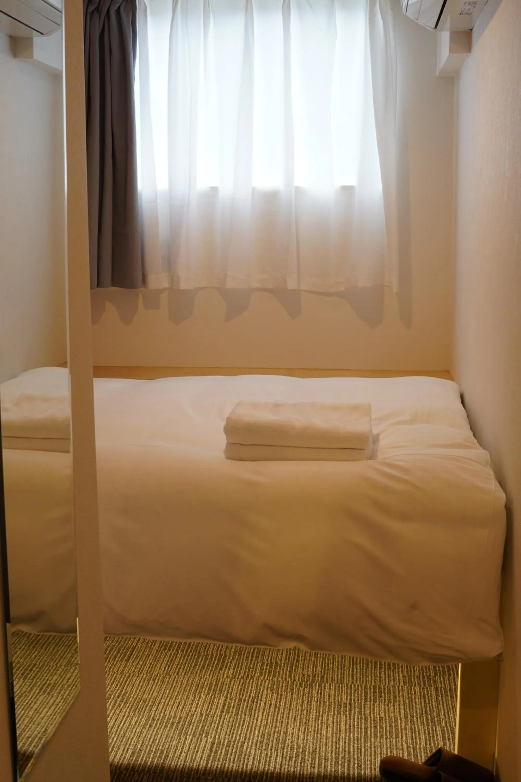 Bed in Softlight Inn Asakusa Tokyo