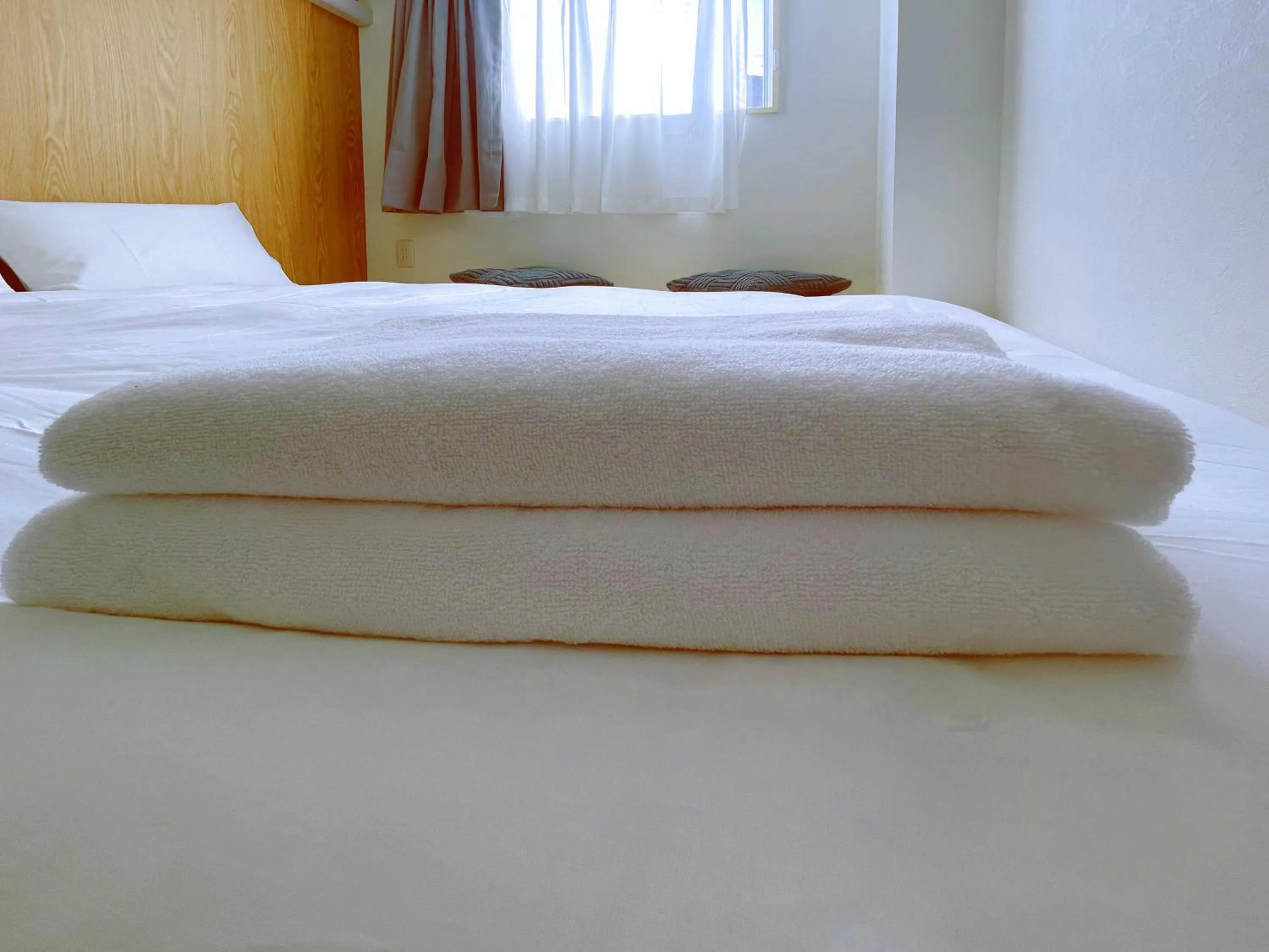 towels, Bed in Softlight Inn Asakusa Tokyo