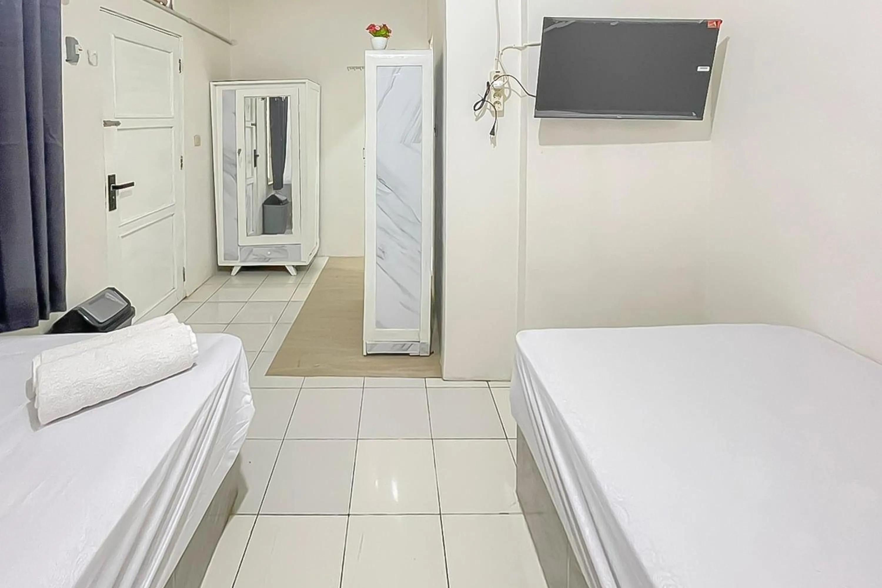 Bedroom, Bed in Urbanview Grey CSB Mall Cirebon