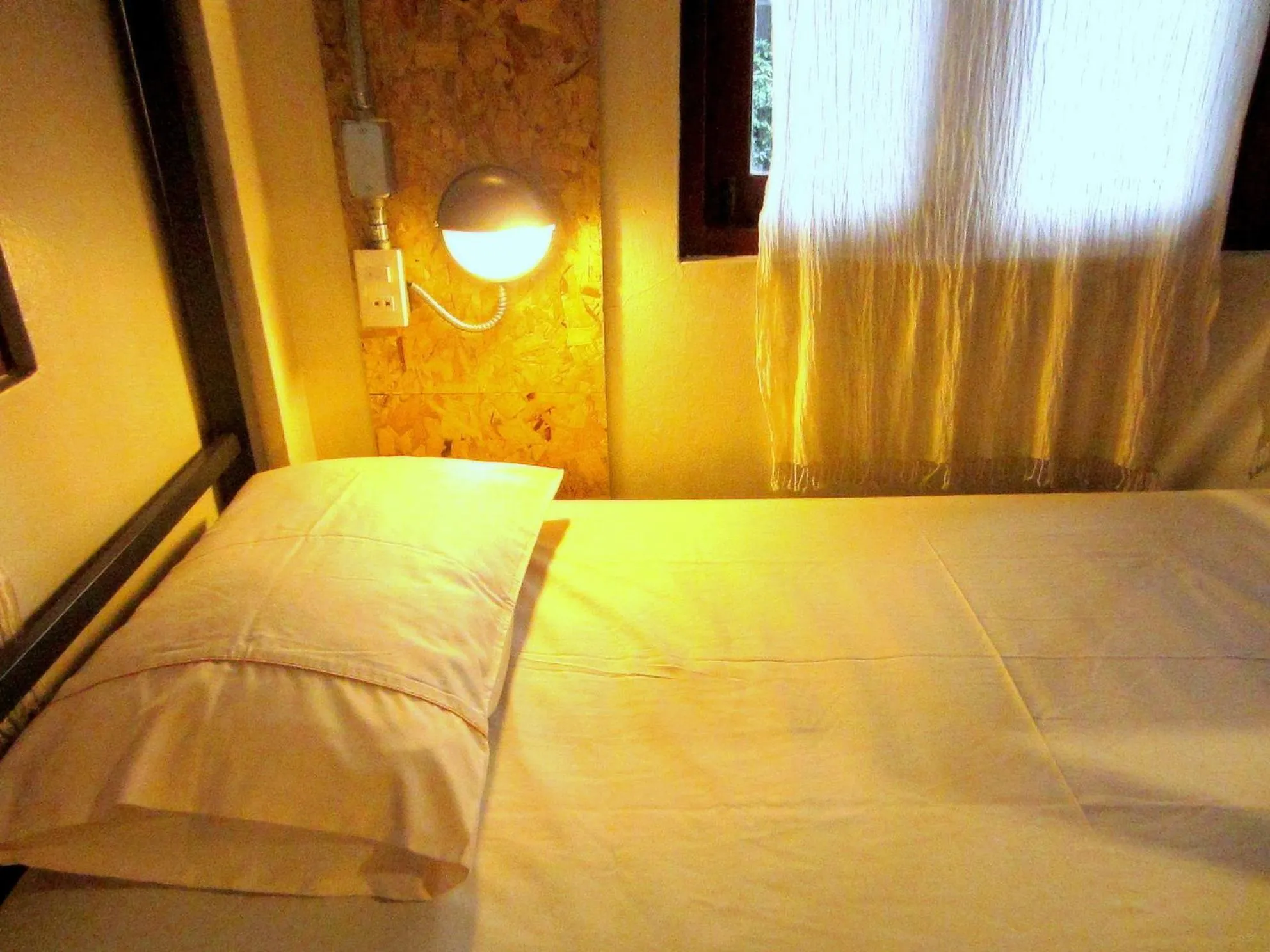 Decorative detail, Bed in Chiang Mai D Hostel