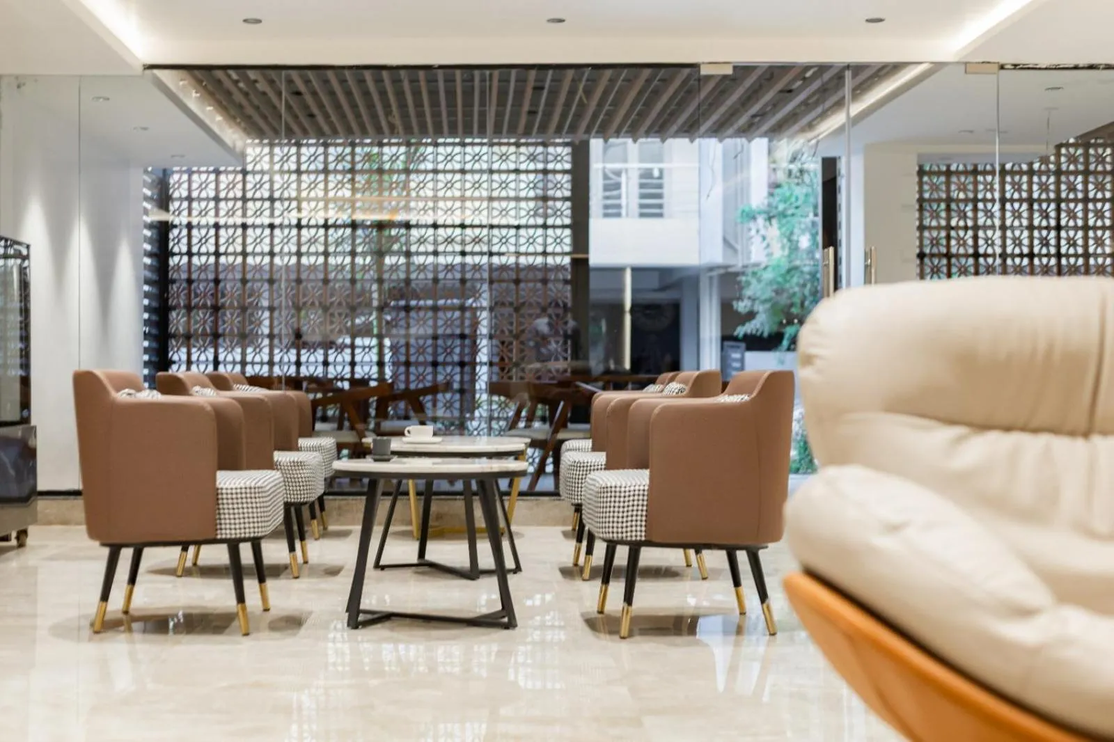 Seating area in Akoya Business Hotel Whitefield