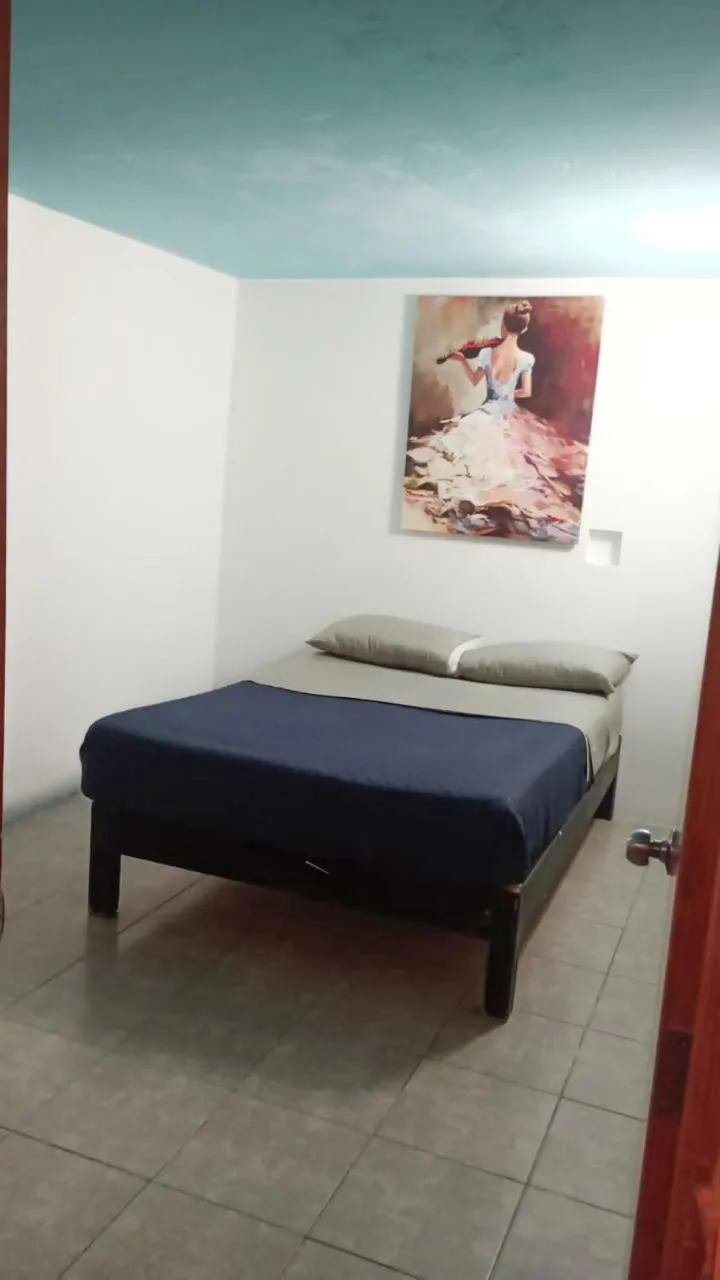 Bed in Hotel RJ Querétaro