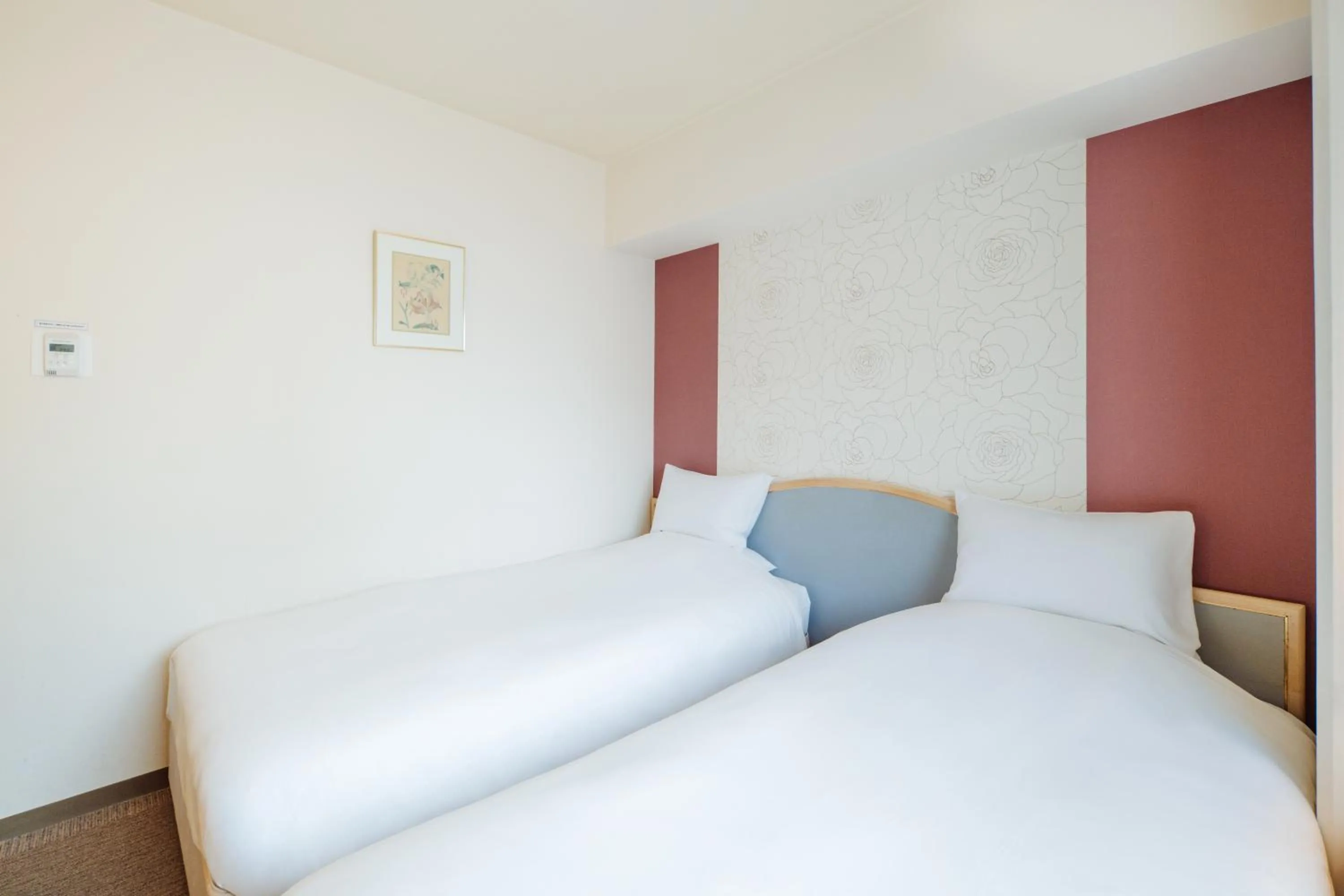 Photo of the whole room, Bed in Nest Hotel Matsuyama