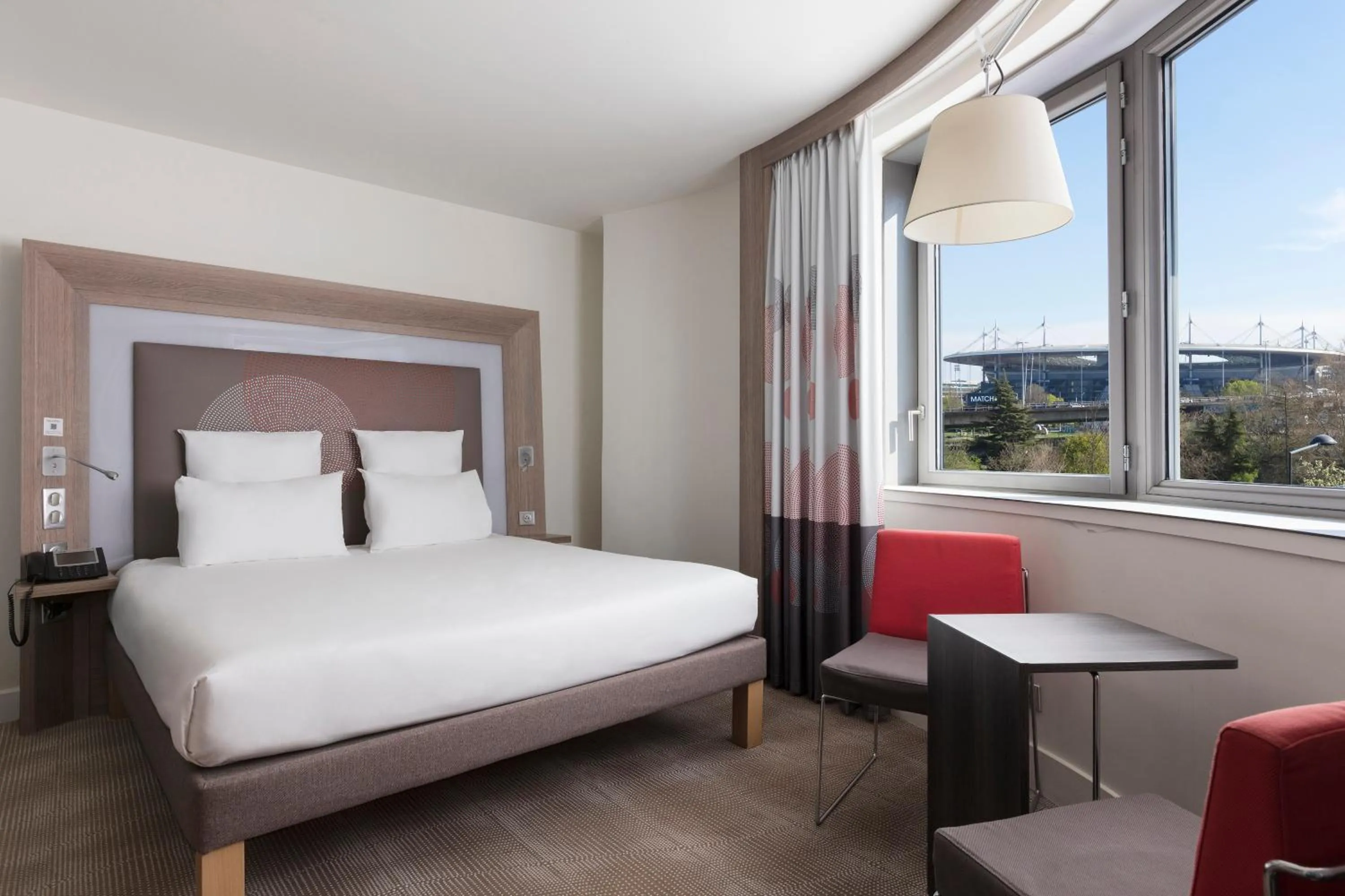 Bed in Novotel Paris Saint Denis Stade Basilique