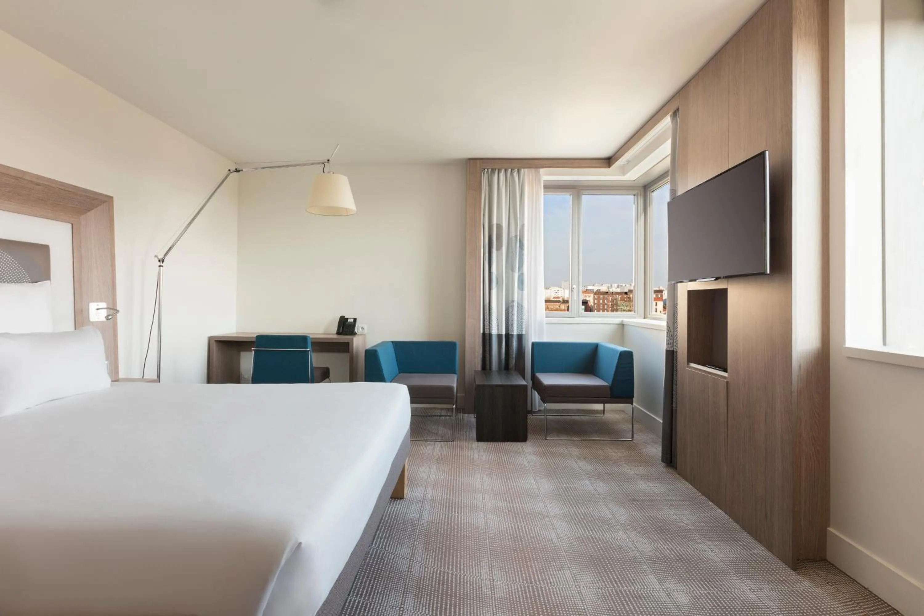 Bed in Novotel Paris Saint Denis Stade Basilique