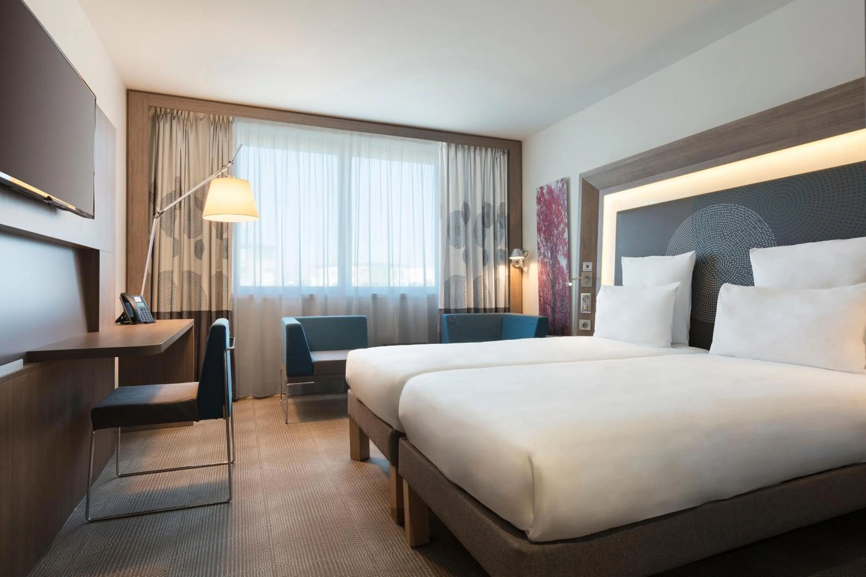 Bed in Novotel Paris Saint Denis Stade Basilique