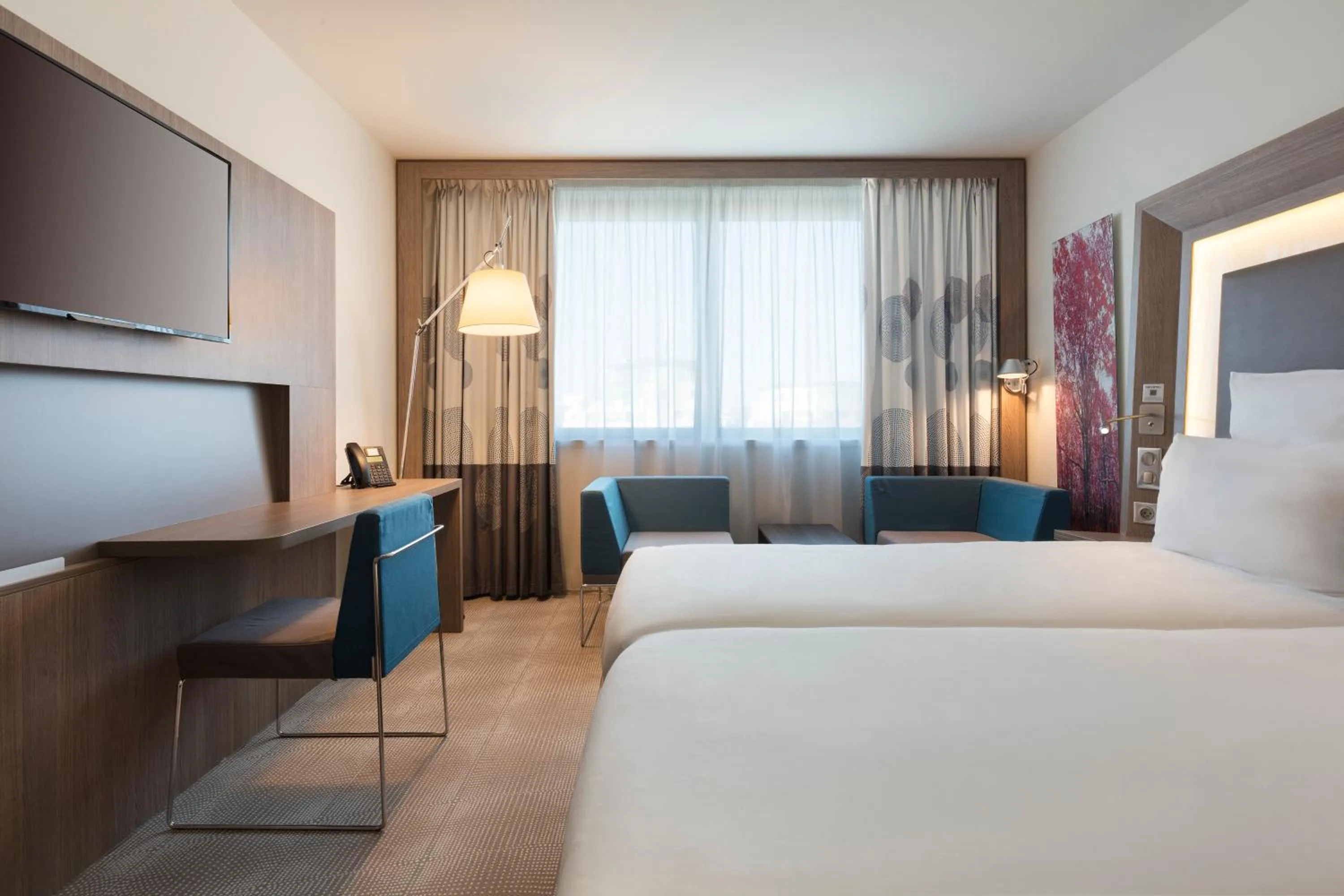 Bed in Novotel Paris Saint Denis Stade Basilique