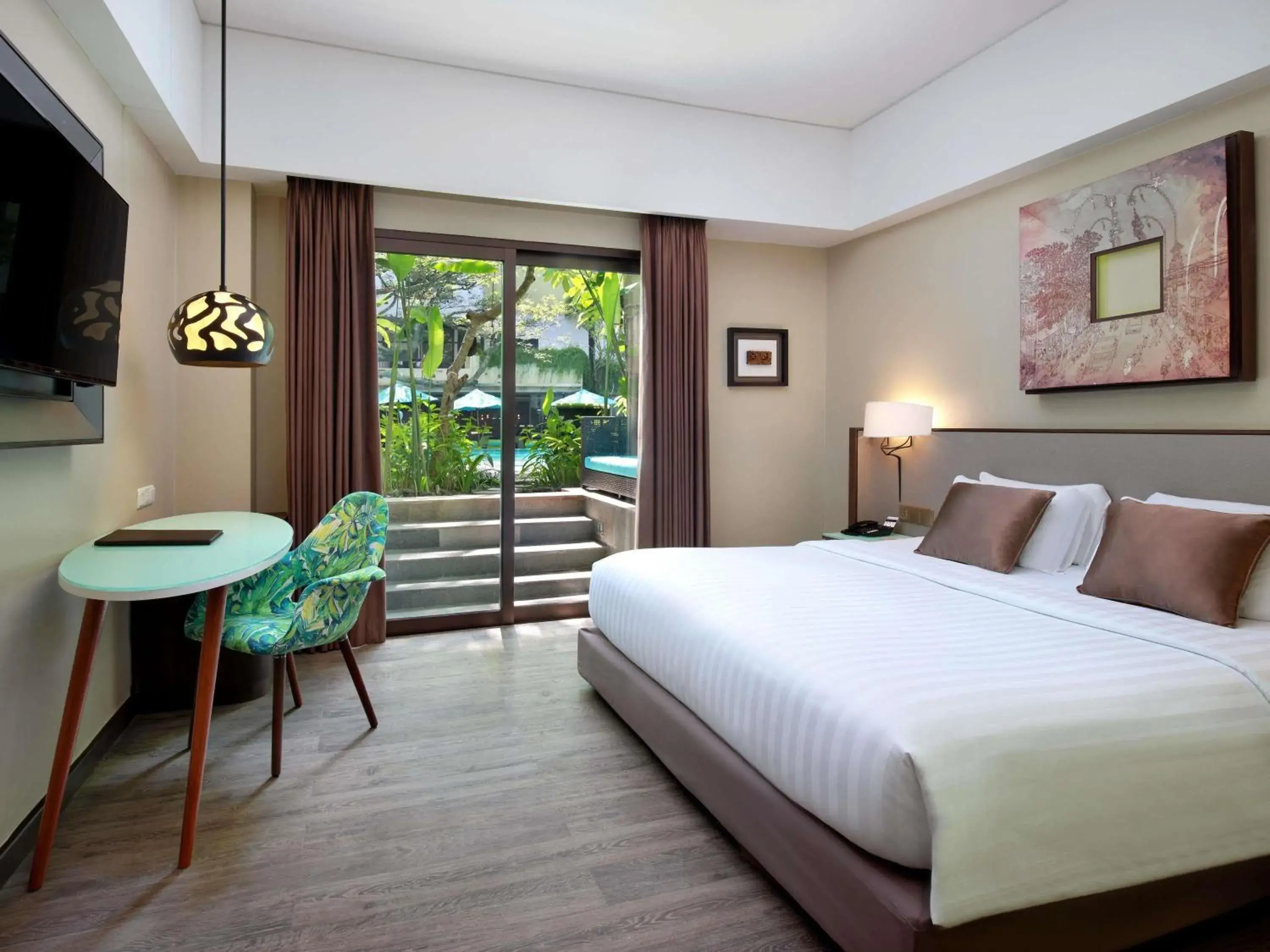 Deluxe King Room with Terrace and Pool Access in Mercure Bali Legian Deluxe King Room with Terrace and Pool Access in Mercure Bali Legian