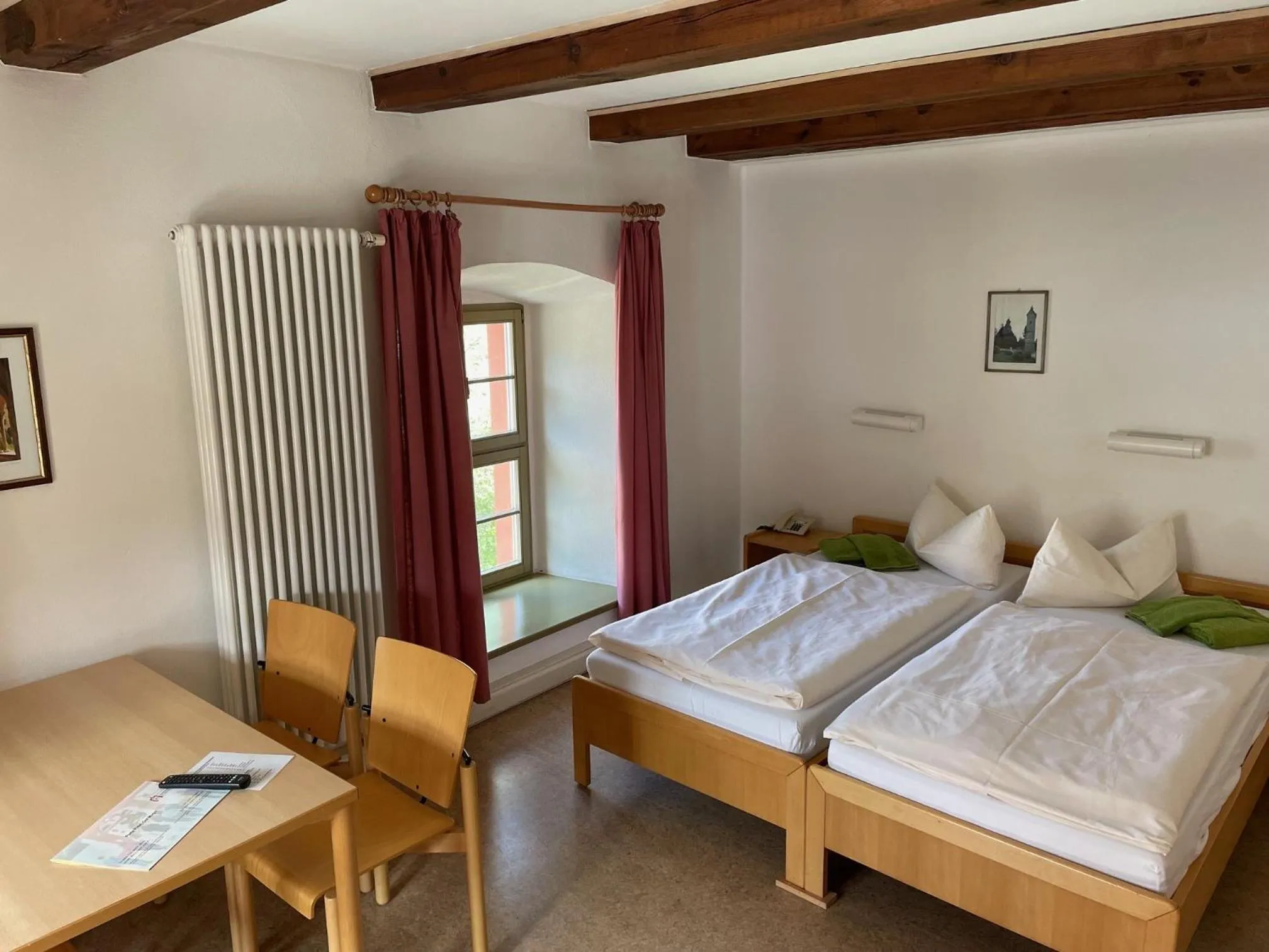 Photo of the whole room, Bed in Gästehäuser St. Marienthal