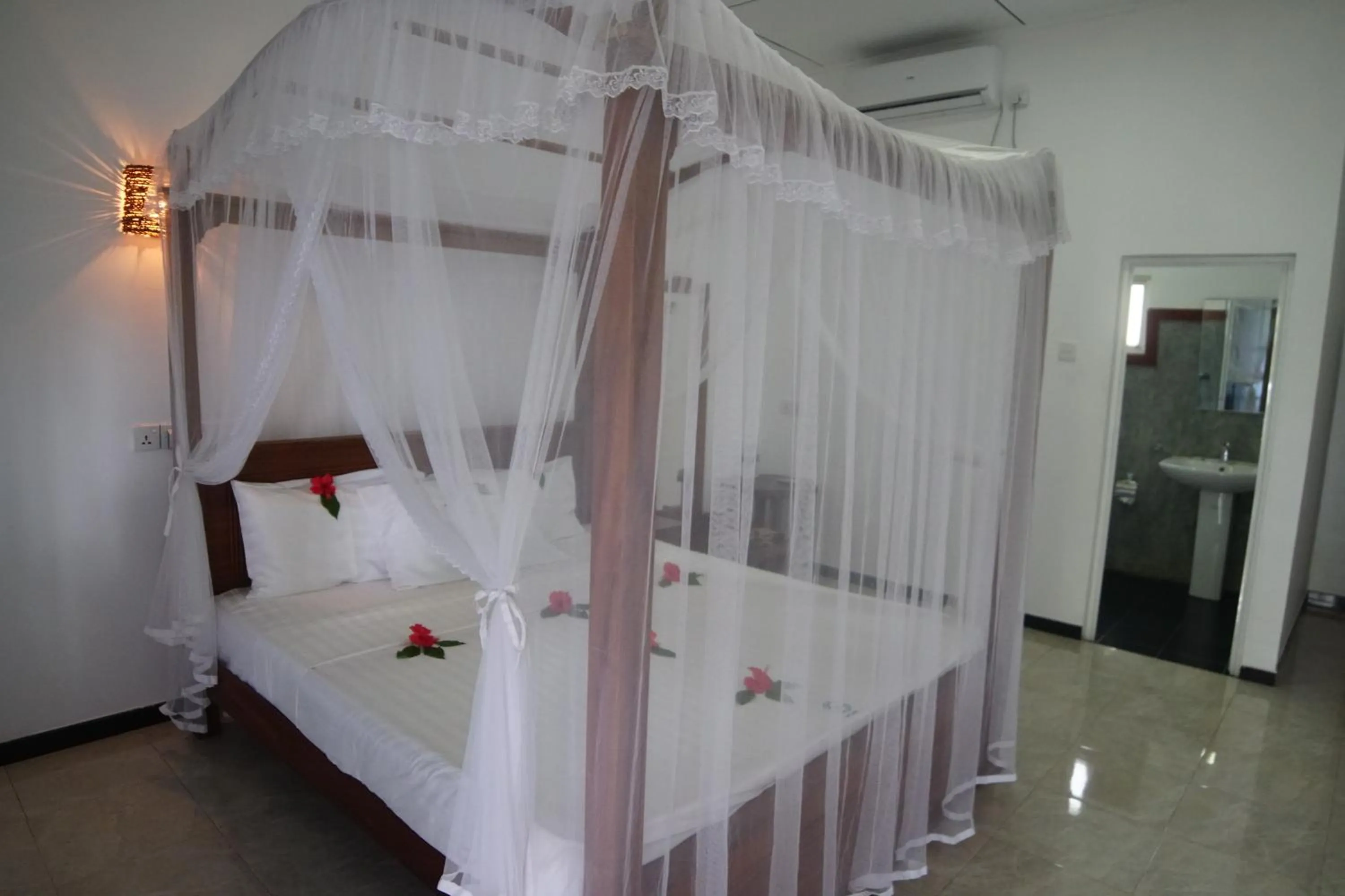 Bed in Turtle Bay Beach Resort