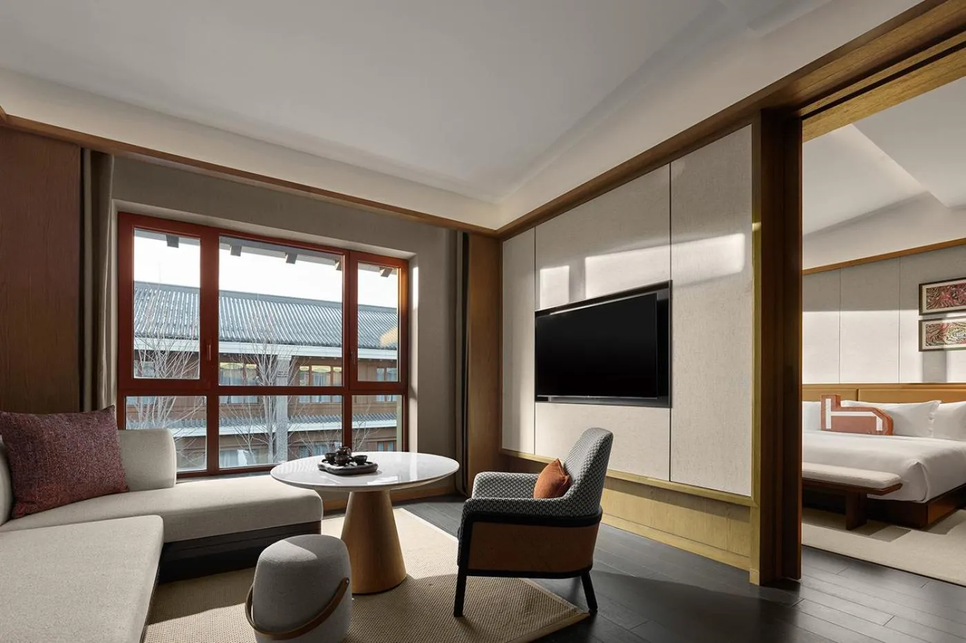 Living room, Bed in Homm Changchun Beihu