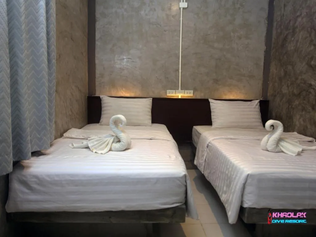 Bed in Khaolak Dive Resort