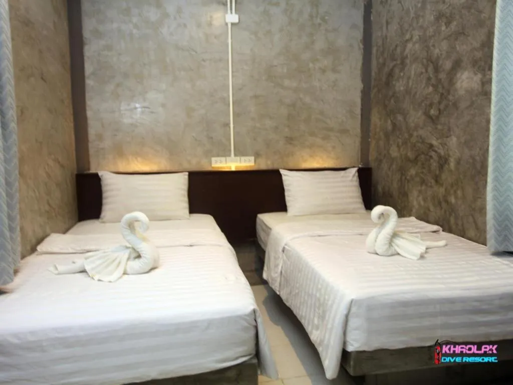 Bed in Khaolak Dive Resort