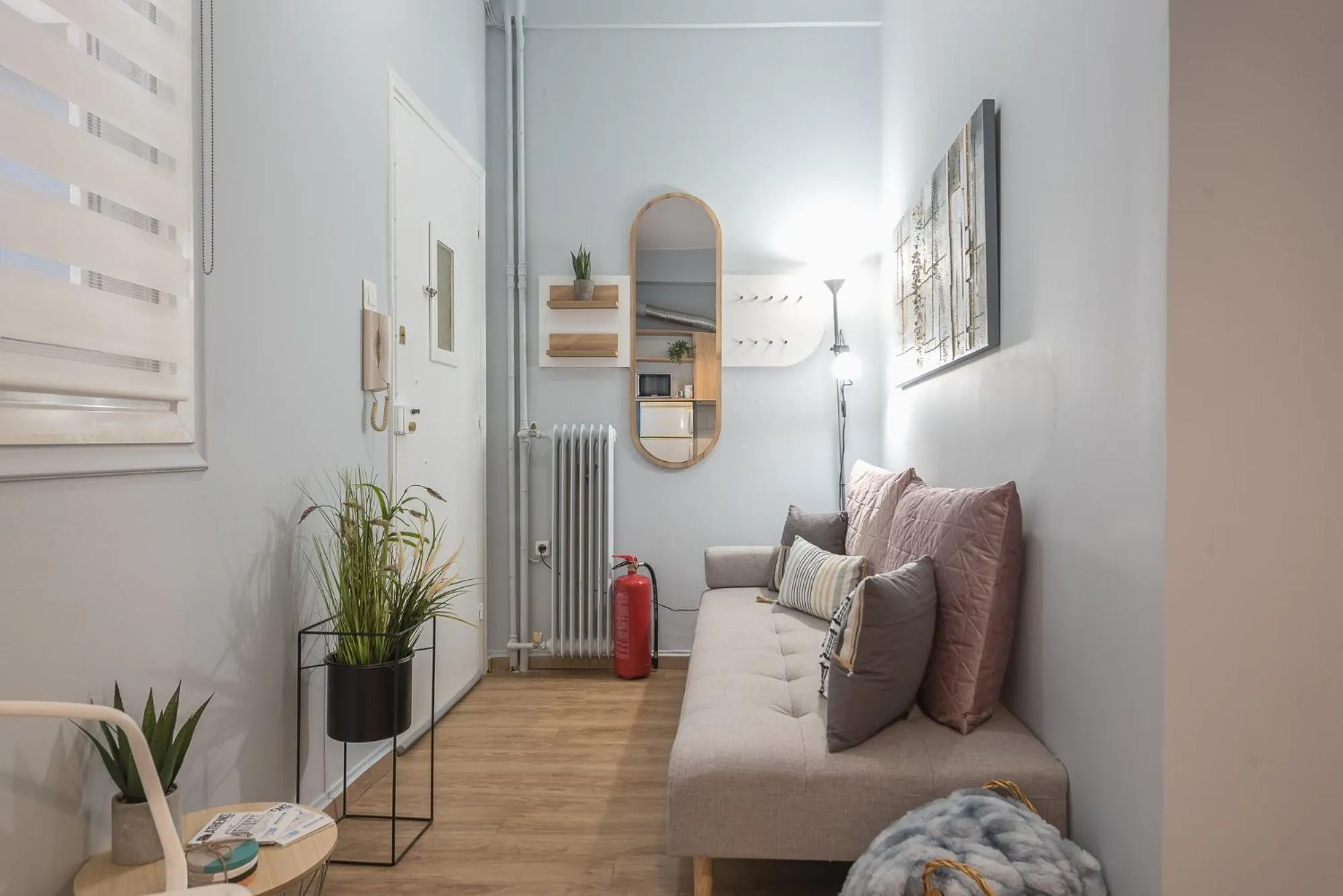 Living room in City Nest Apartment by Cloudkeys