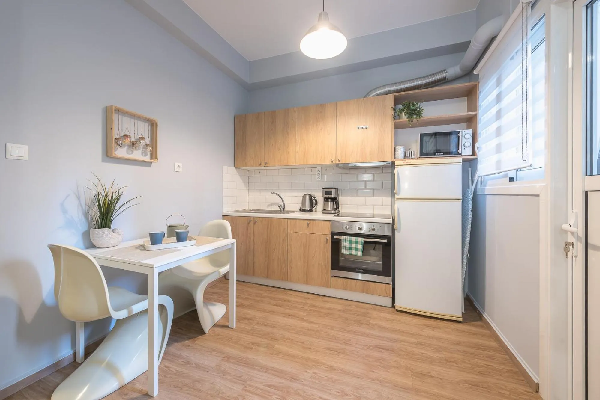 Coffee/tea facilities in City Nest Apartment by Cloudkeys