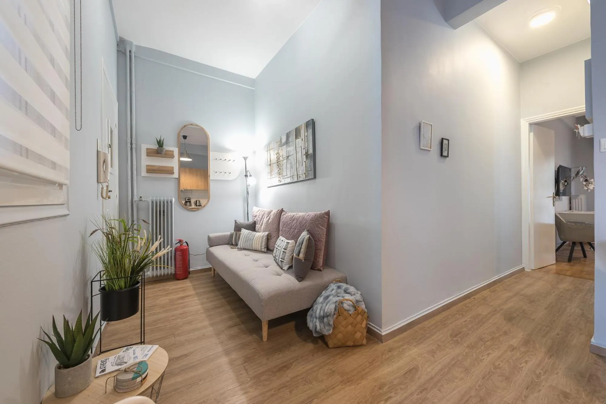 Living room, Bed in City Nest Apartment by Cloudkeys