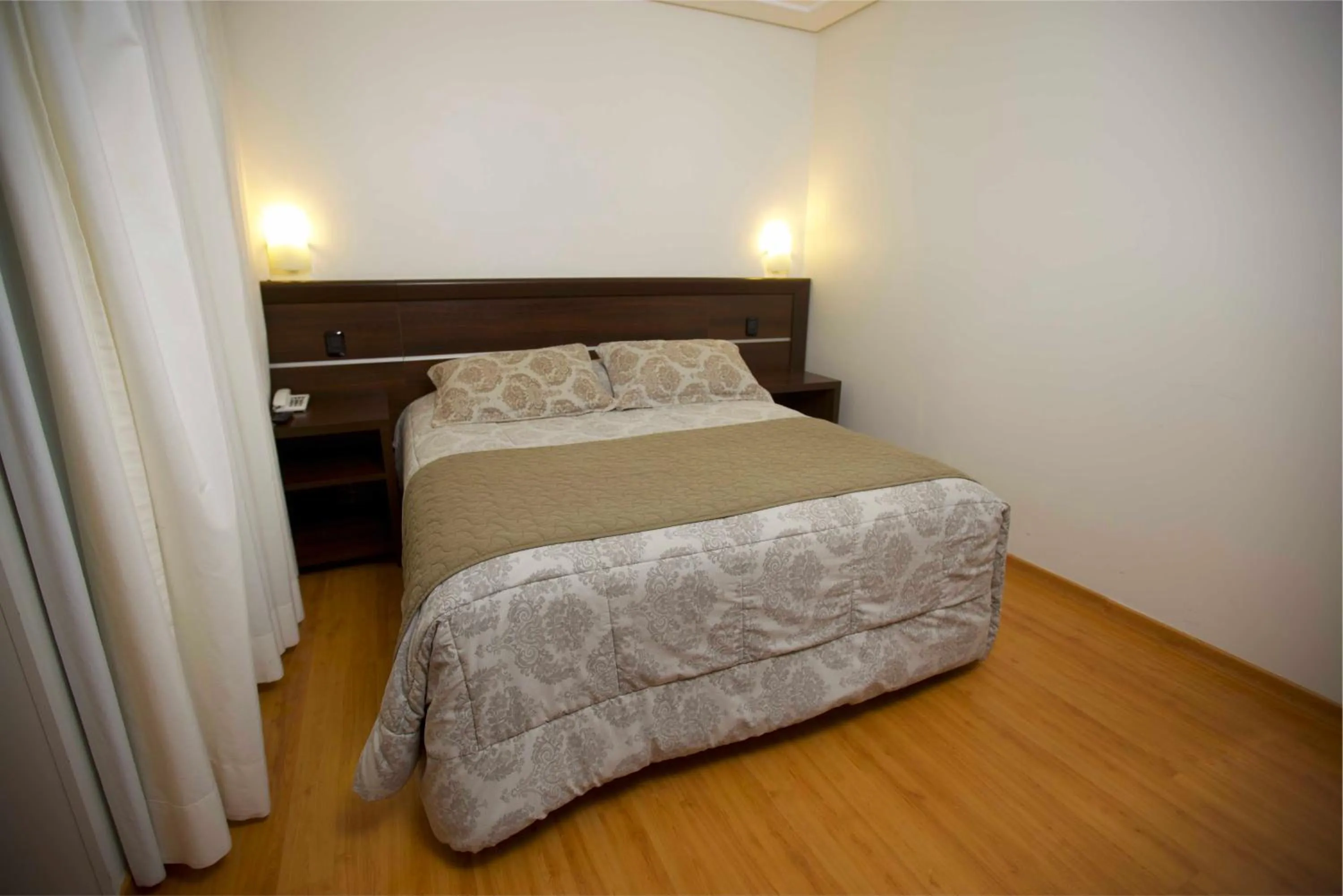 Bed in Mogano Premium Hotel - ELETROPOSTO