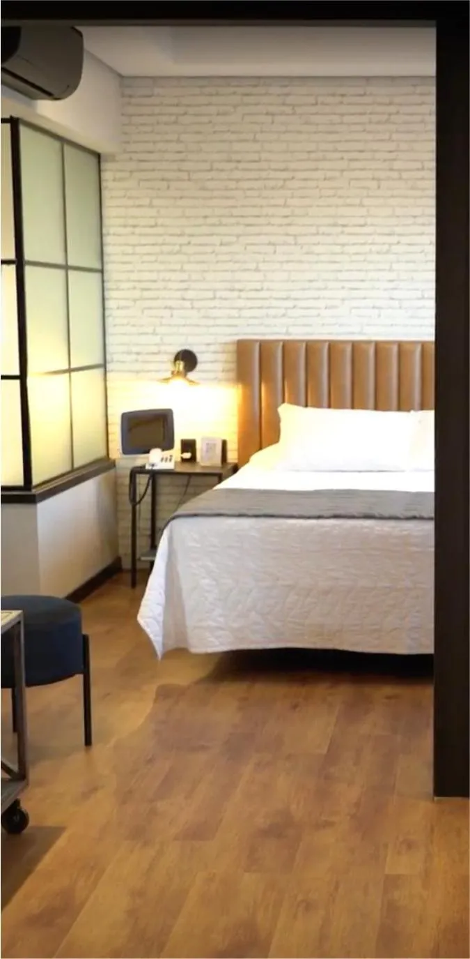 Bed in Mogano Premium Hotel - ELETROPOSTO