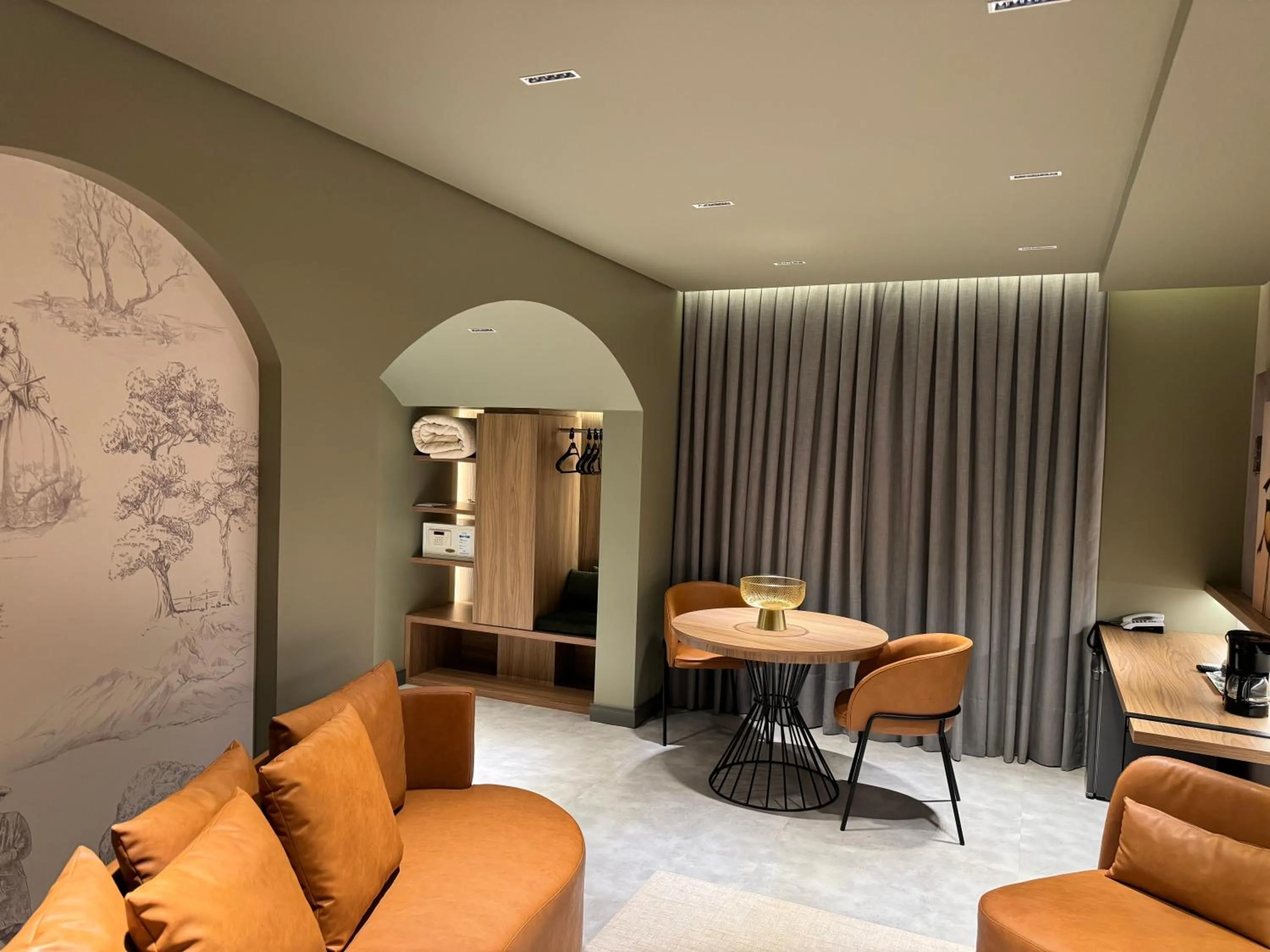 Living room in Mogano Premium Hotel - ELETROPOSTO