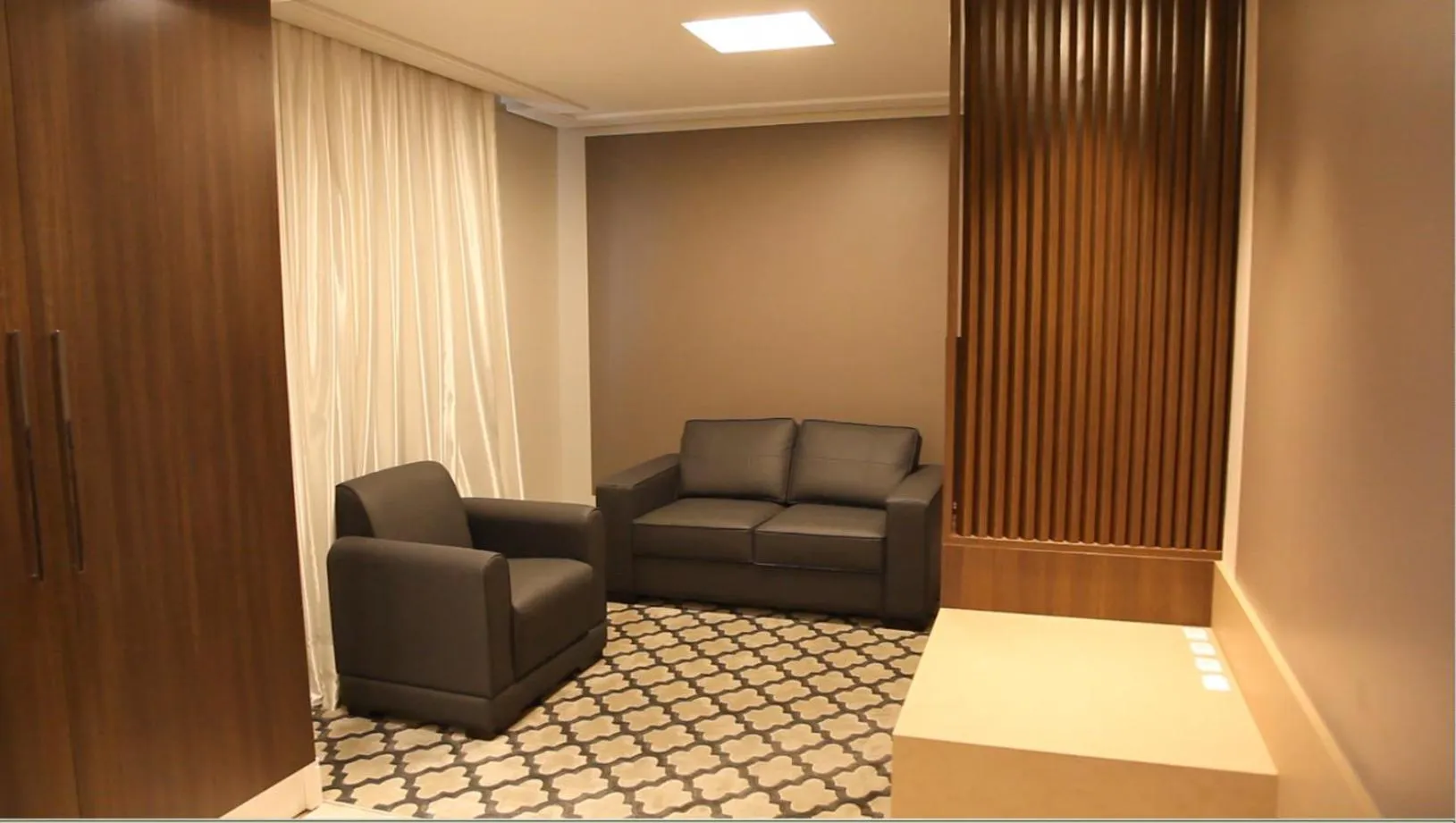 Living room in Mogano Premium Hotel - ELETROPOSTO