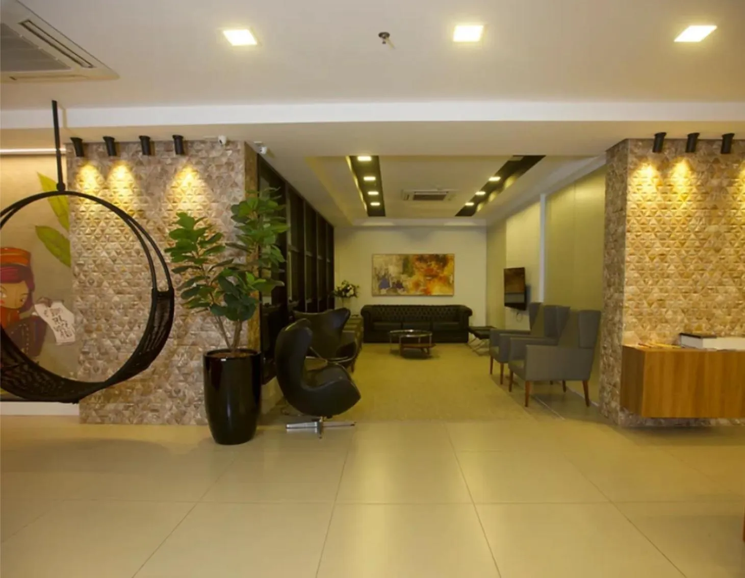 Lobby or reception in Mogano Premium Hotel - ELETROPOSTO