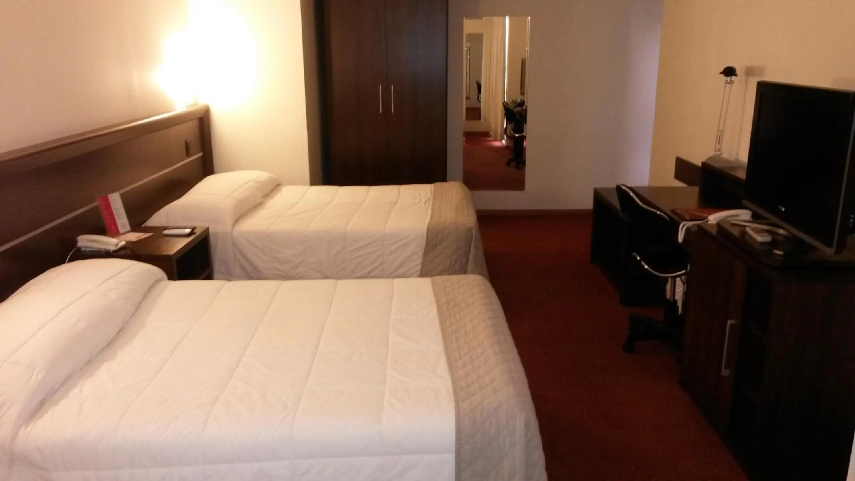 Bed in Mogano Premium Hotel - ELETROPOSTO