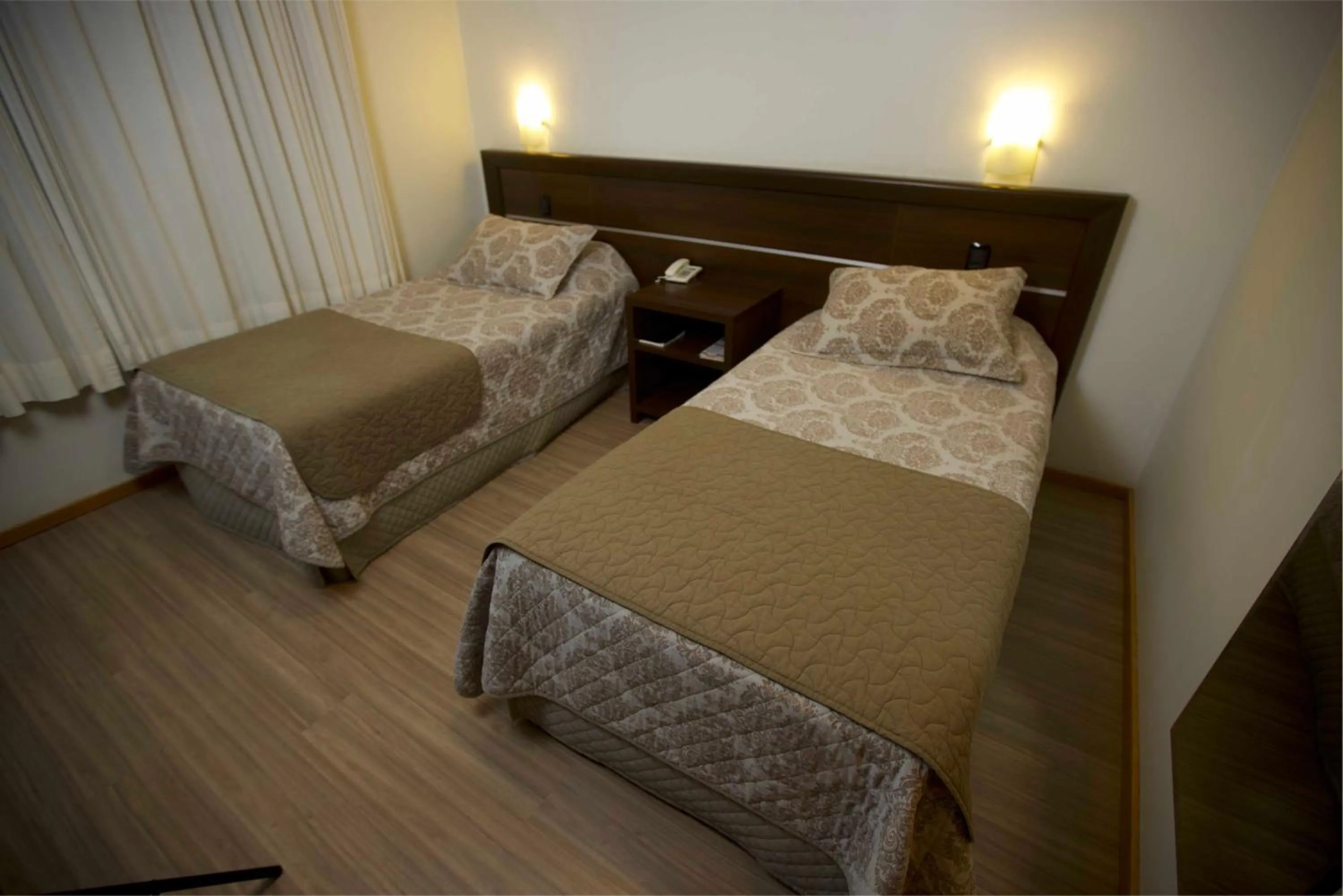 Bed in Mogano Premium Hotel - ELETROPOSTO
