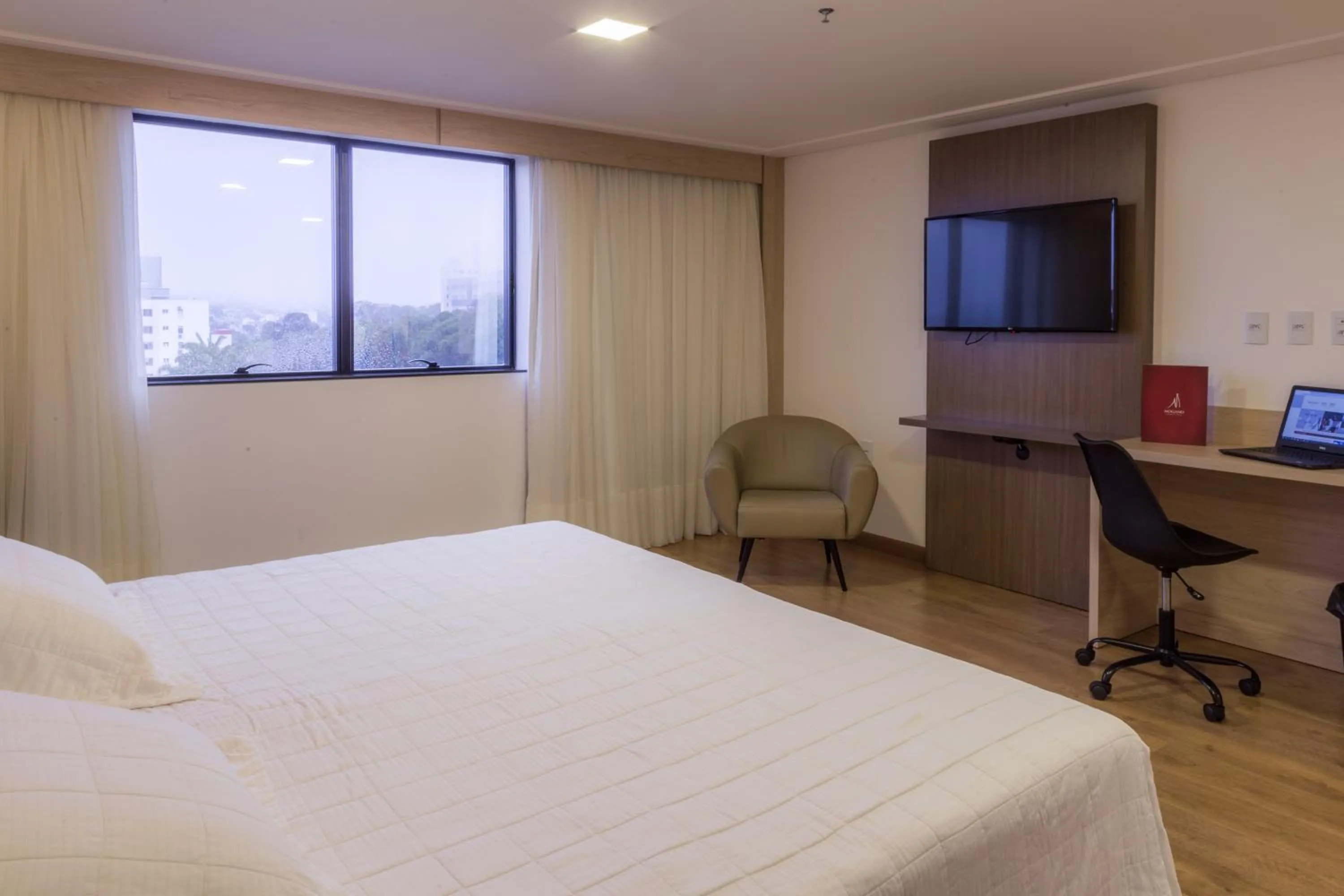 Bed in Mogano Premium Hotel - ELETROPOSTO