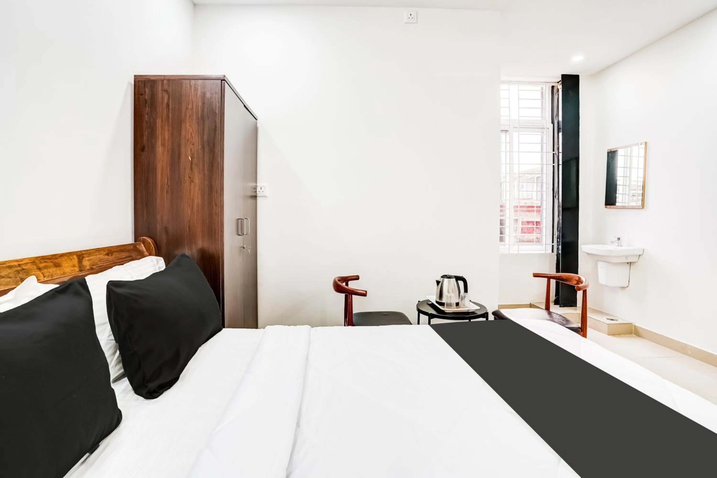 Bedroom, Bed in Super Hotel O HMR Inn