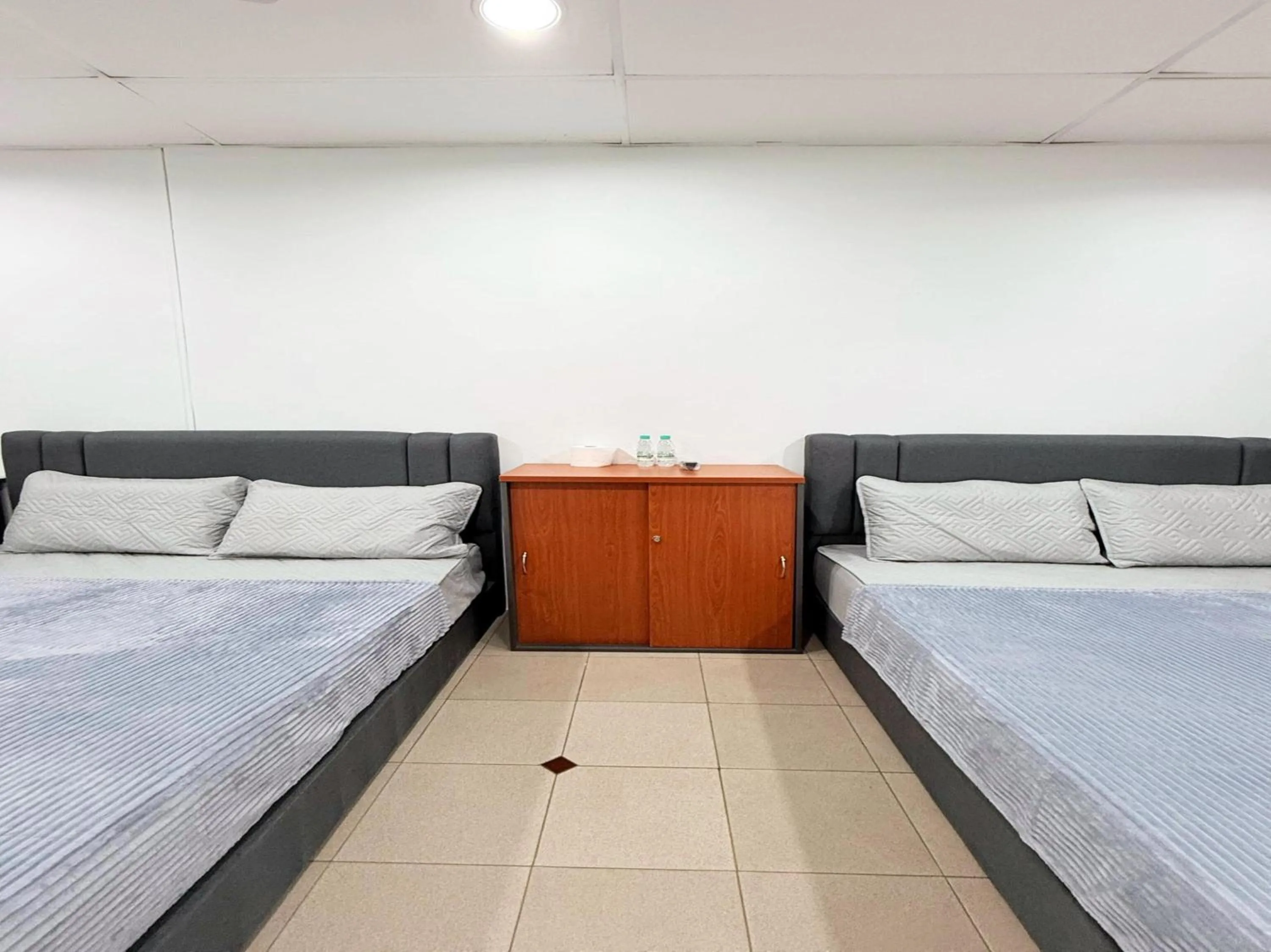 Bedroom, Bed in Hotel O S Homestay Premium