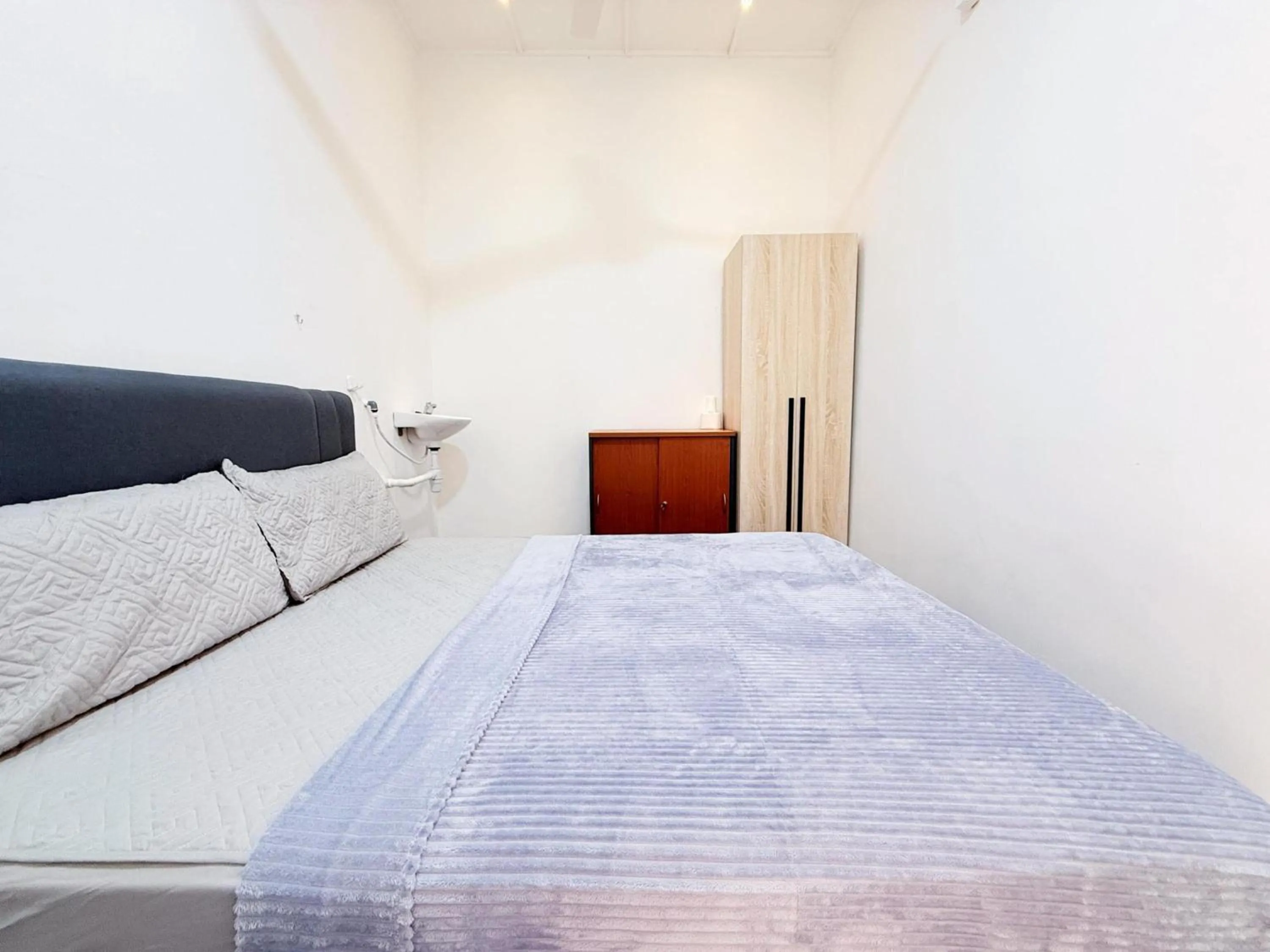 Bedroom, Bed in Hotel O S Homestay Premium