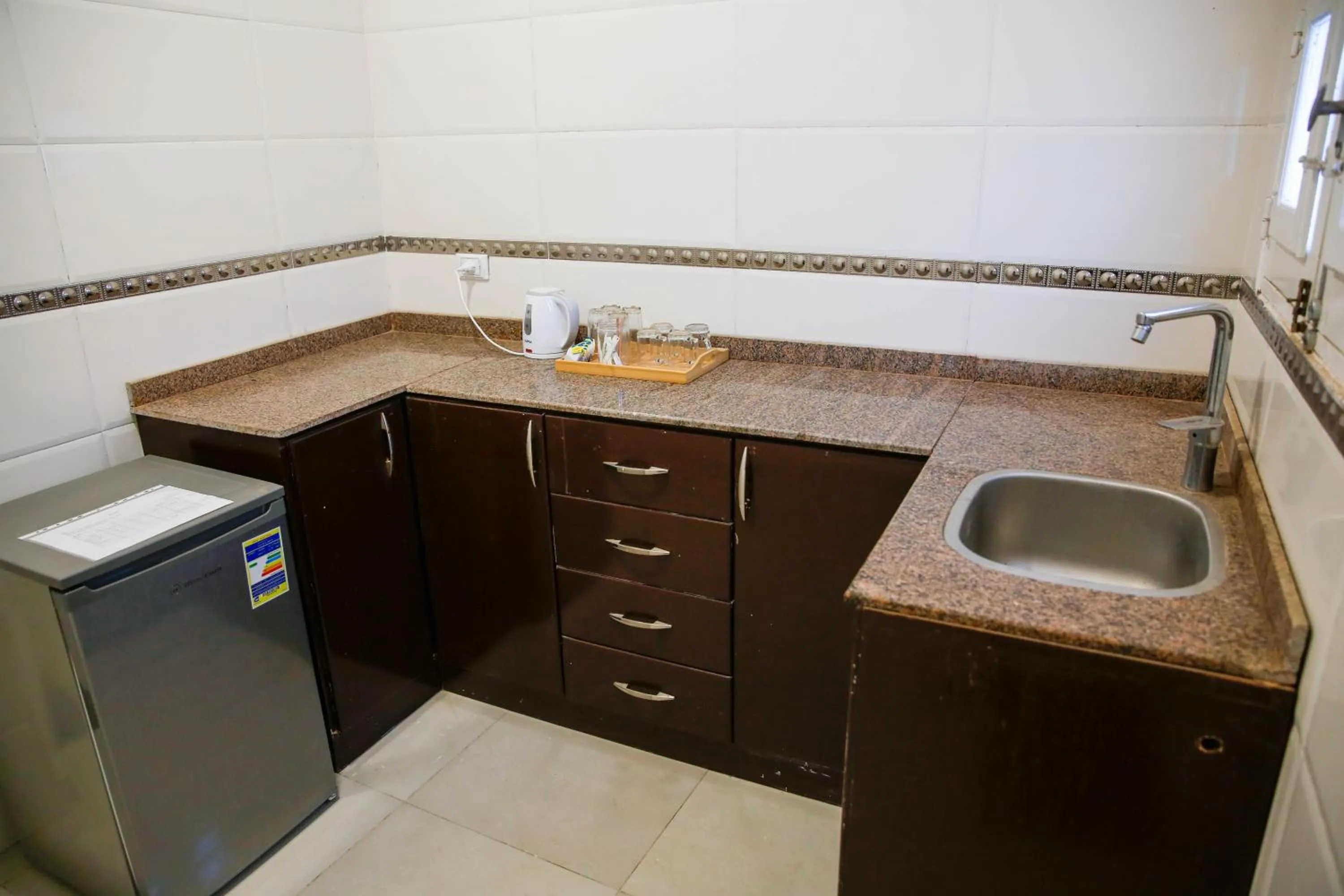 Kitchen or kitchenette in Sharqotel Luxor