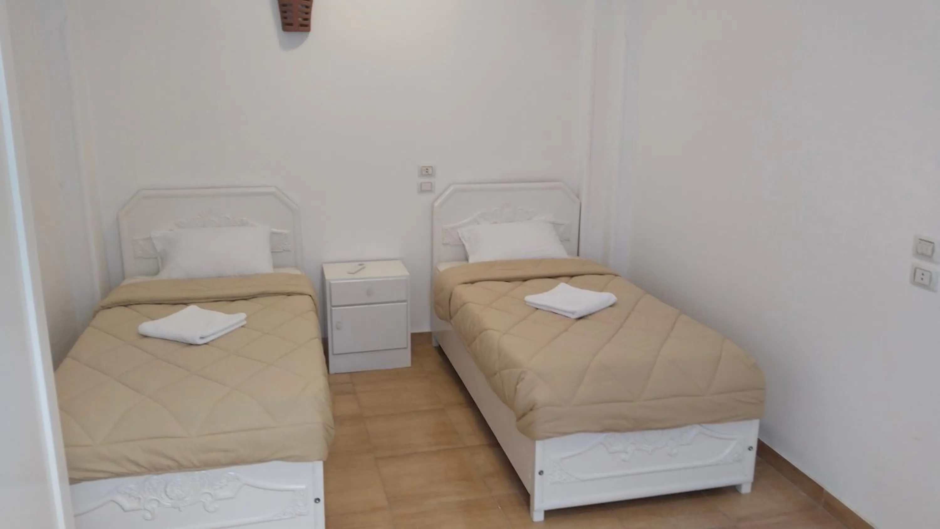 Bed in Sharqotel Luxor