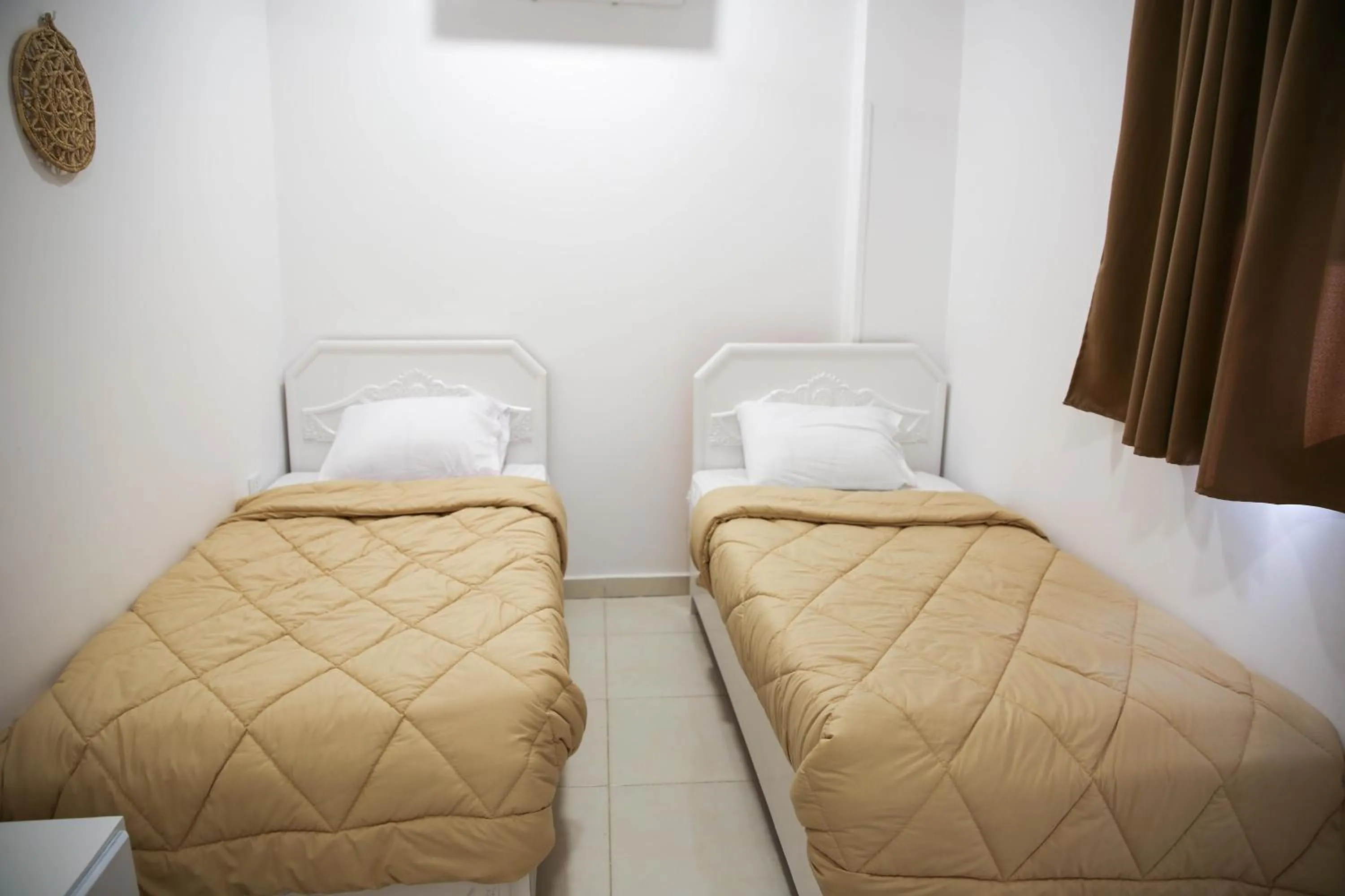 Bed in Sharqotel Luxor