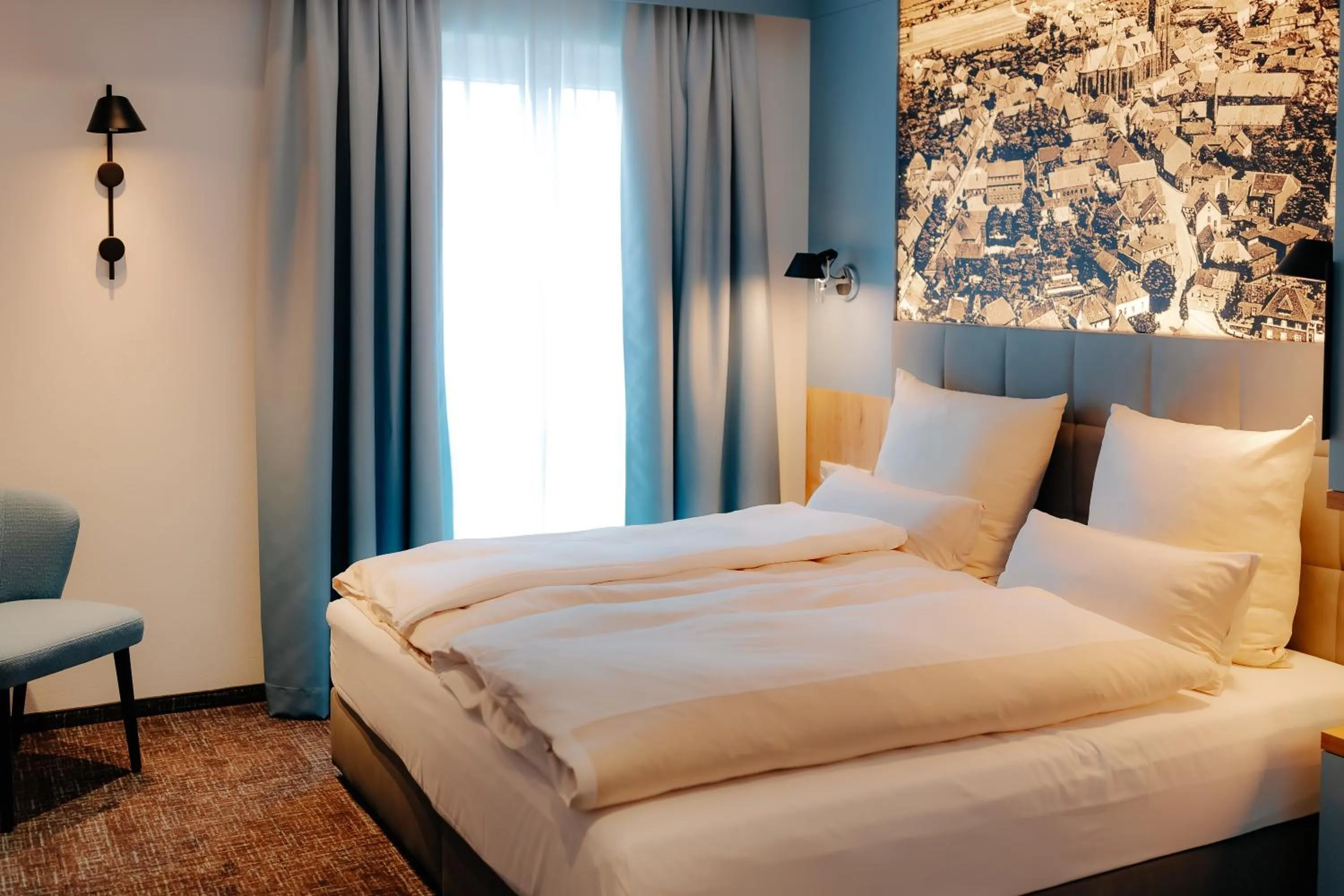 Photo of the whole room, Bed in Stadthöfe Rhede by Hackmann