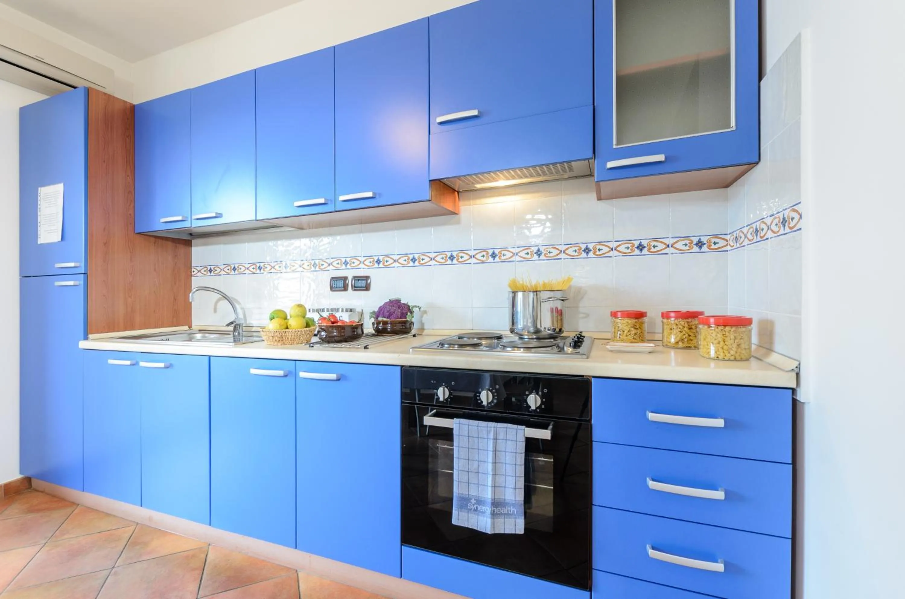 Kitchen or kitchenette in Le Tartarughe Aparthotel