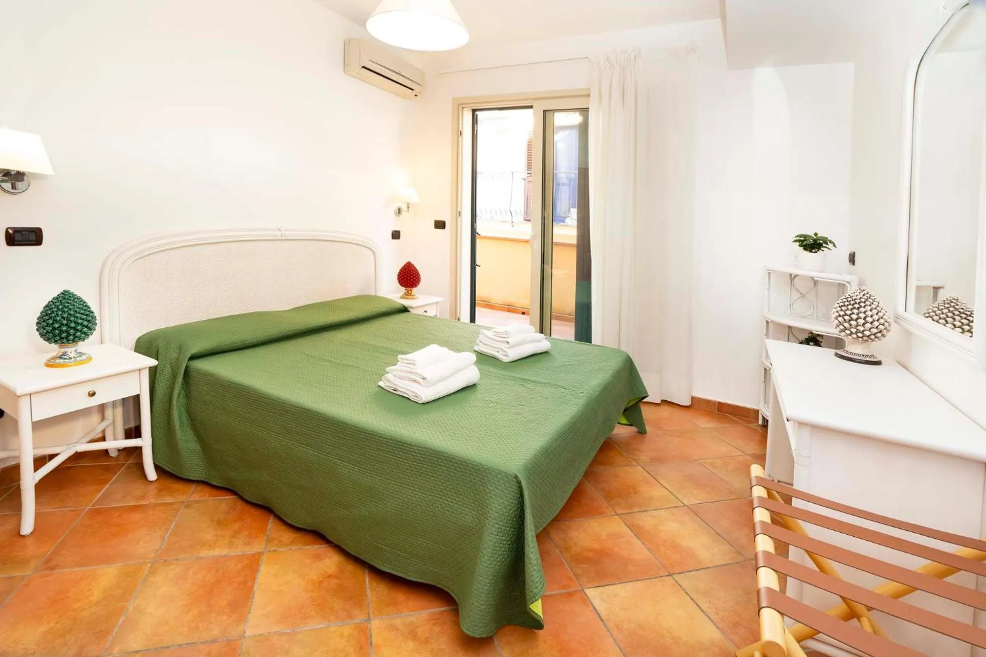 Bed in Le Tartarughe Aparthotel