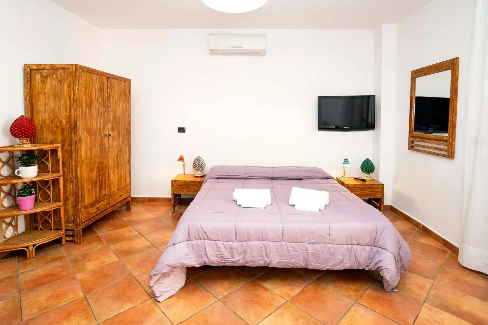 Bed in Le Tartarughe Aparthotel